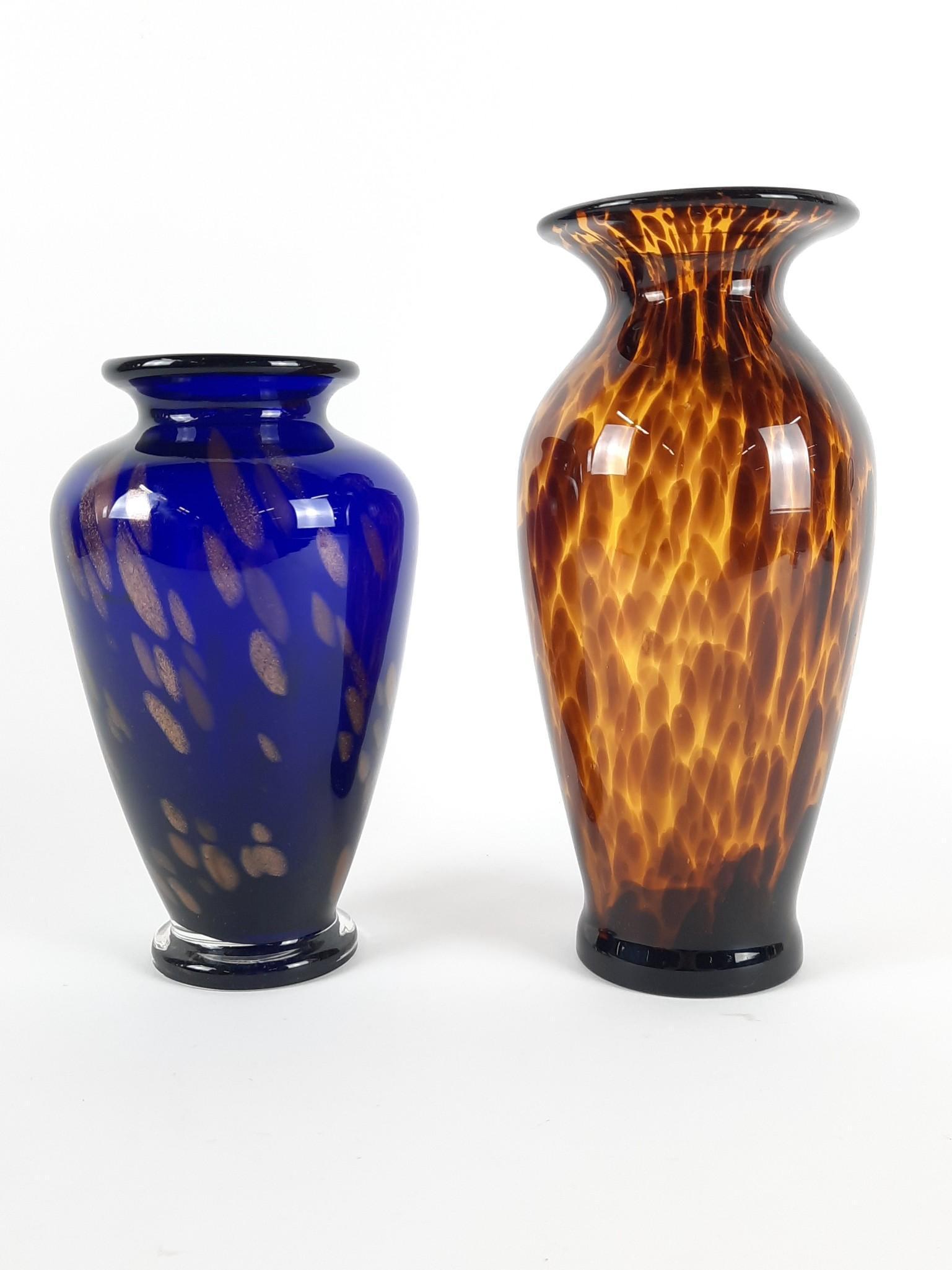 2 Art Glass Vases incl Tortise Shell: Both unsigned. 4-3/4" to 5" diameter x 8-3/4" to 10-1/2" high. LR IMPORTANT: Before bidding, please read the terms and conditions. When you registered for the auction you agreed to these terms and wil