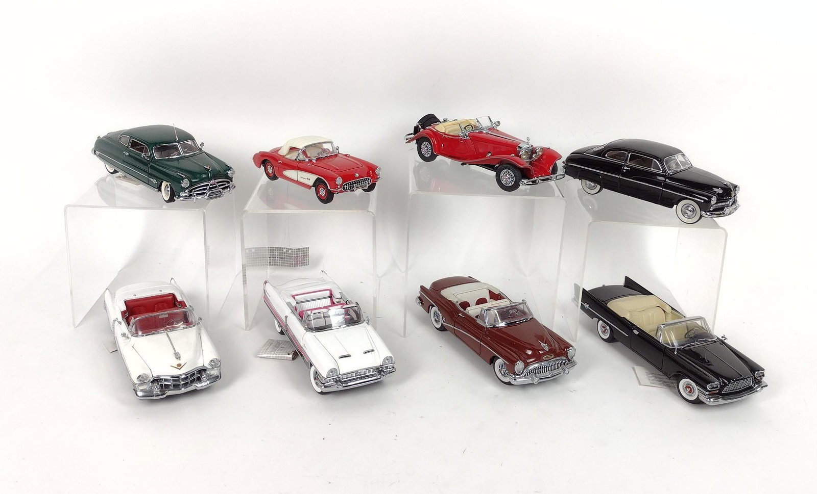 8 Franklin Mint Die Cast Cars: Each 1:24 scale. 7" to 9" long X 3" to 3-1/2" high. MEG IMPORTANT: Before bidding, please read the terms and conditions. When you registered for the auction you agreed to these terms and will be requi