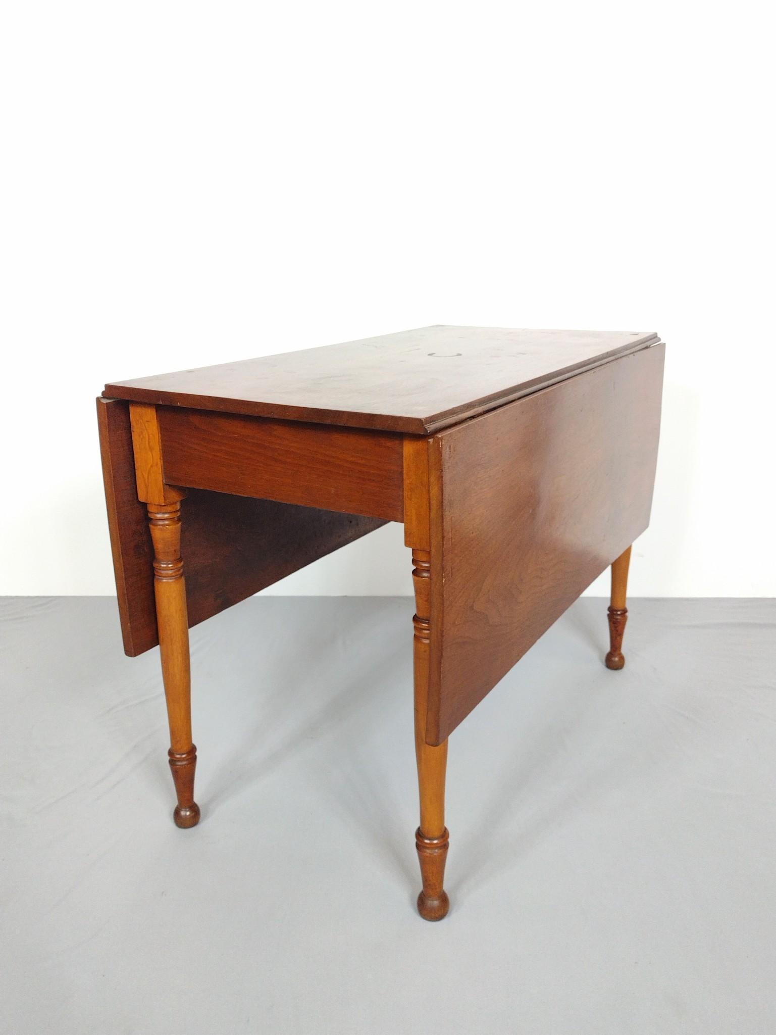 Drop Leaf Table: Open 50", closed 21" wide X 39" deep X 28-1/2" high. Has some light scratches and areas of discoloring. MG. IMPORTANT: Before bidding, please read the terms and conditions. When you registered for the
