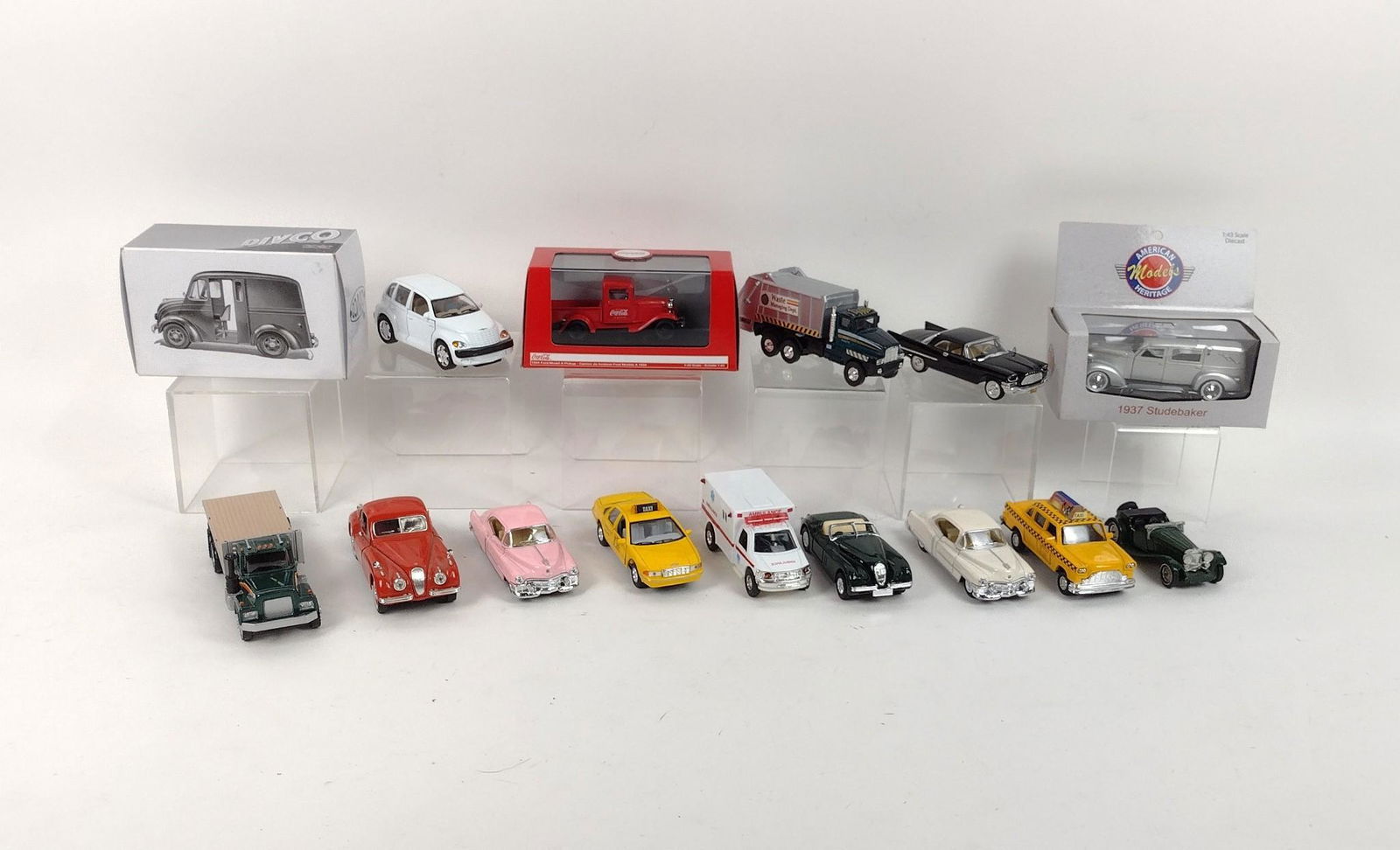 15 Die Cast Cars: Makers: Saico, Matchbox, Jul, KinSmart, Signature, and Ertel. MEG IMPORTANT: Before bidding, please read the terms and conditions. When you registered for the auction you agreed to these terms and wil