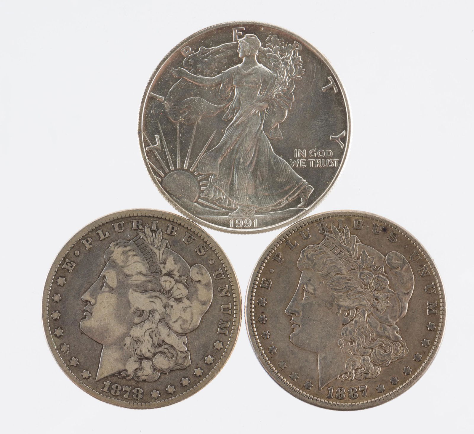 2 Morgan Silver Dollars & American Silver Eagle (1 of 2)