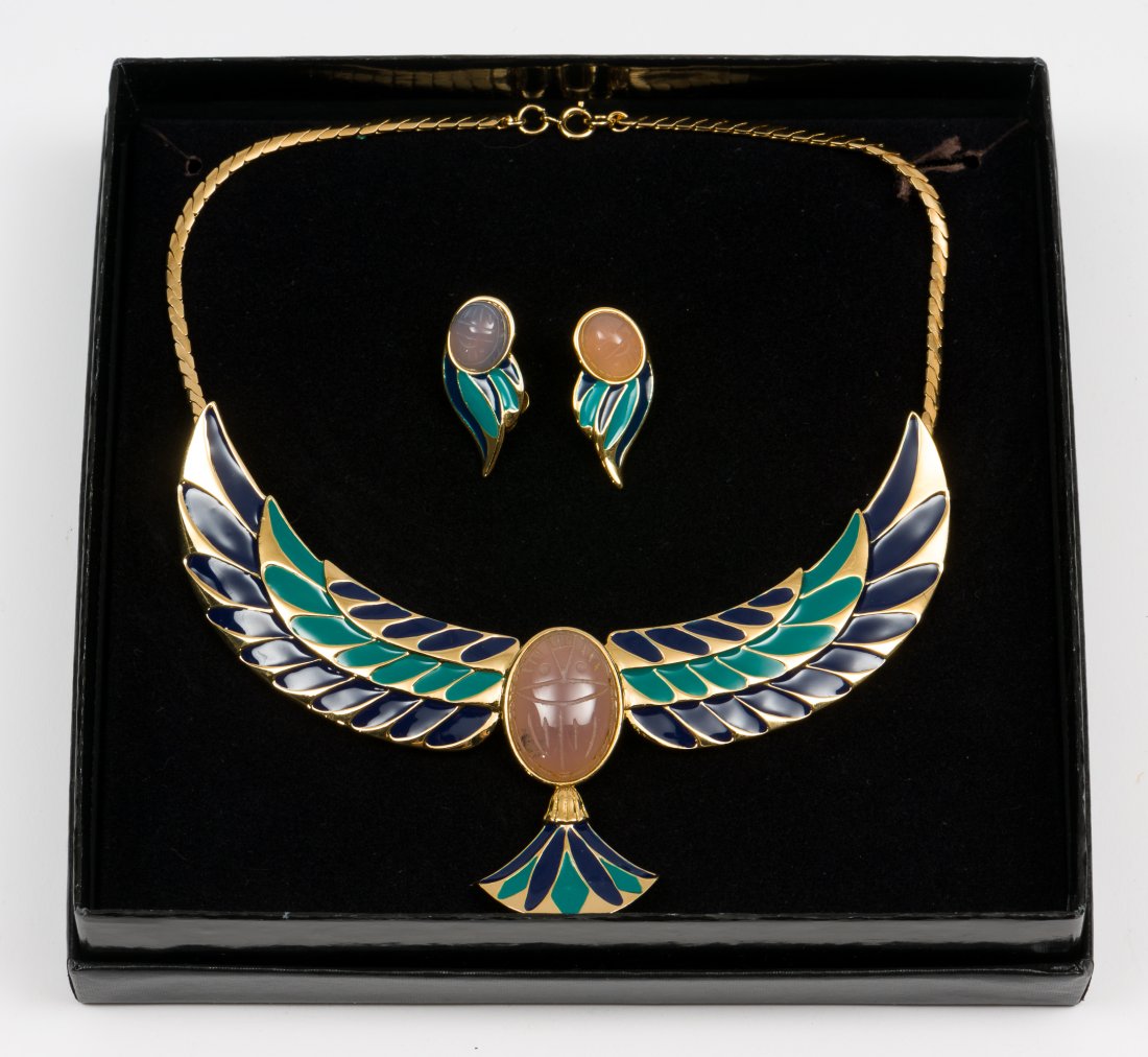 Franklin Mint Jewel of the Nile Necklace & Earrings: With scarab at center. Includes paperwork and in original box. Pendant 4-1/2" long. Overall 14" long. Clip on earrings 1-1/4" long. DP. IMPORTANT: Before bidding, please read the terms and conditions.