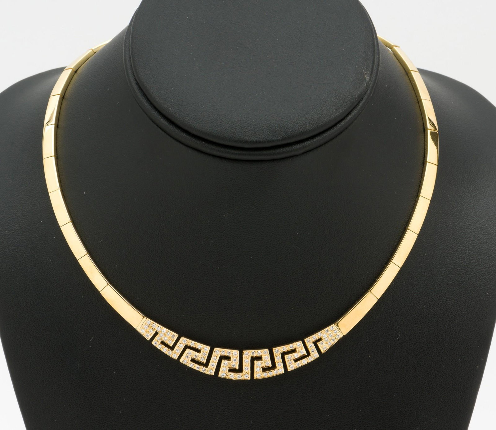 18K Gold & .95 CTW Diamond Necklace: DESCRIPTION: 18k (stamped 750) gold and .95 CTW diamond necklace. Solid bar links with center Greek key design set with 95 bead set round brilliant cut diamonds. Clarity VS2, Color H-I. MEASUREMENTS: 