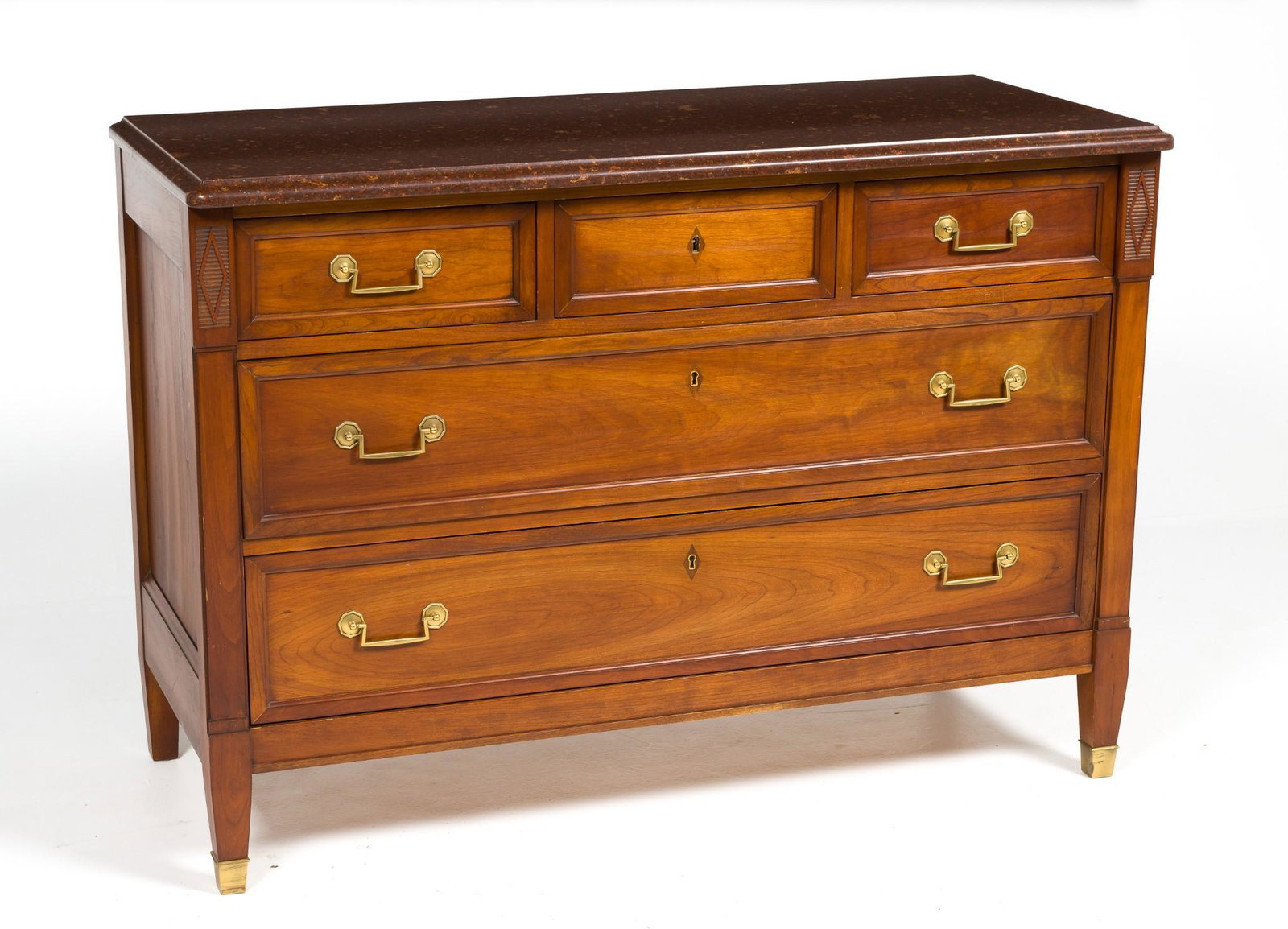 Stickley Quartz Top Dresser: DESCRIPTION: Stickley arts & crafts style quartz top dresser. Three small drawers over two large drawers. Brass hardware and feet covers. Diamond decoration to upper corners of each side. Pink variega