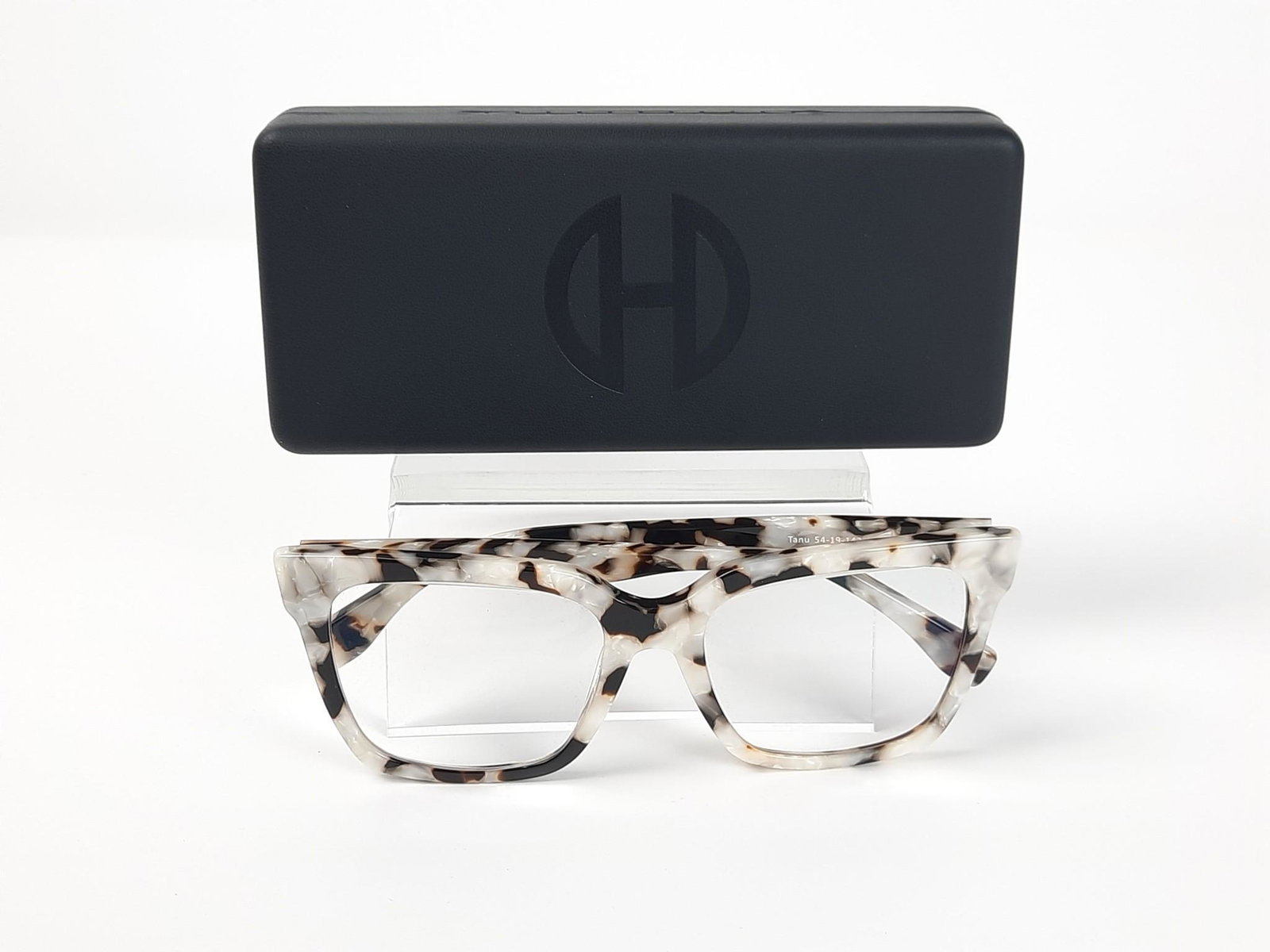 Hip Optical Perscription Glasses: 54-19-143. Style: Tanu. 5-1/4" wide x 5-1/2" long. LR IMPORTANT: Before bidding, please read the terms and conditions. When you registered for the auction you agreed to these terms and will be require