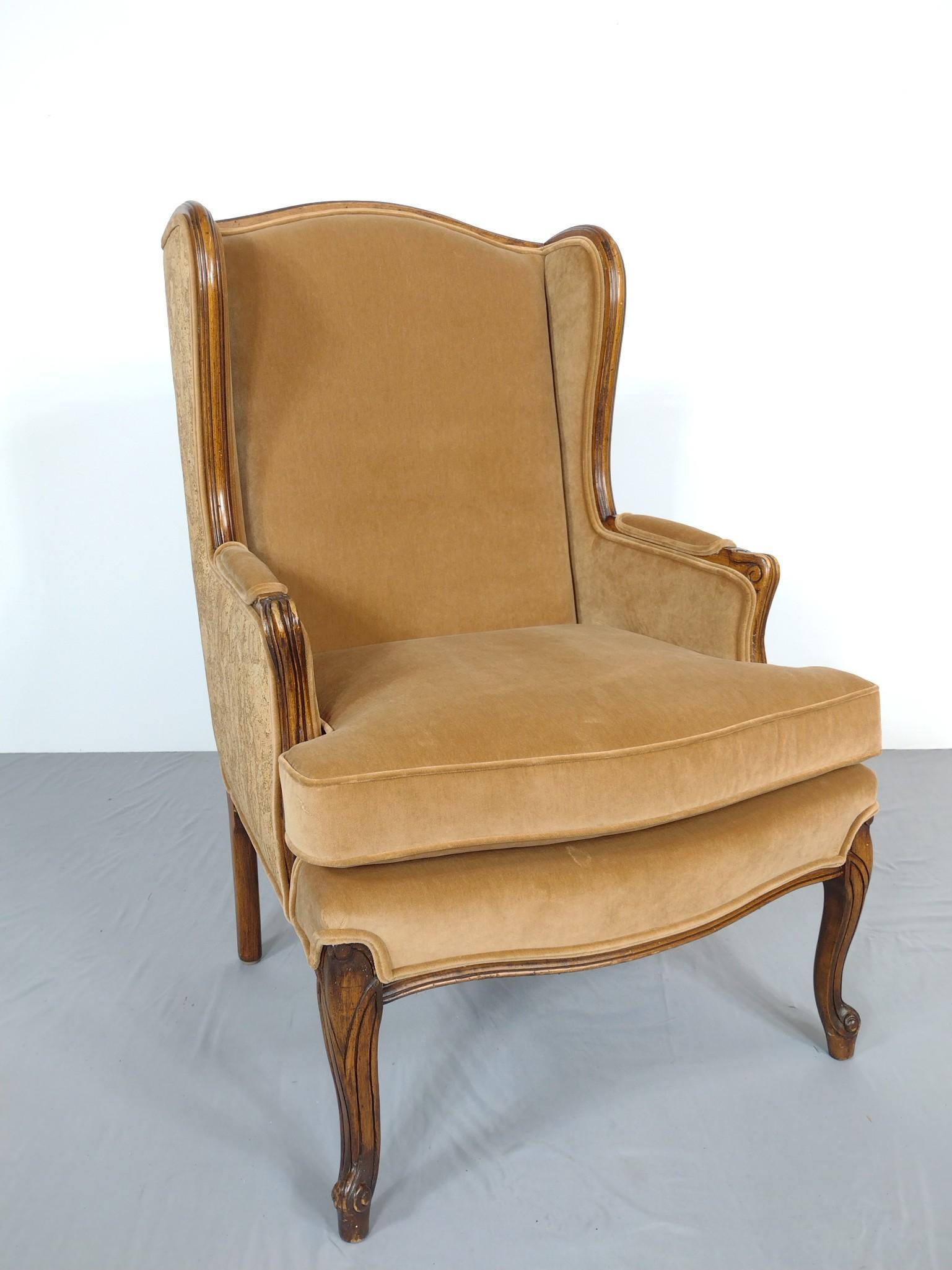 Brown Wingback Chair: 26-1/2" wide X 24" deep X 42-1/2" high. No manufactures name found. MG. IMPORTANT: Before bidding, please read the terms and conditions. When you registered for the auction you agreed to these terms a