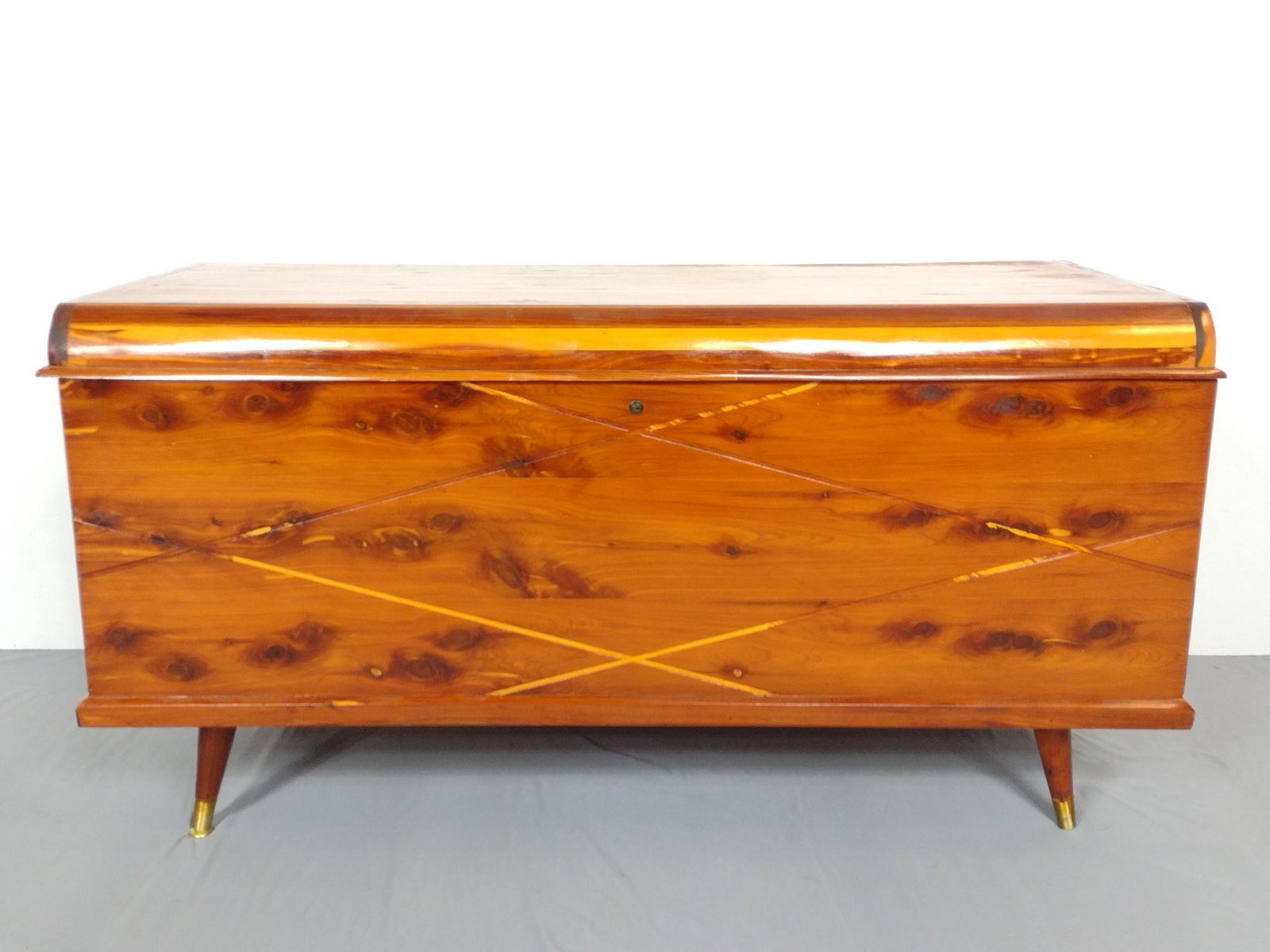 Cedar Chest: 46-1/2" wide X 20" deep X 24" high. Has some scratches. No manufactures name found. MG. IMPORTANT: Before bidding, please read the terms and conditions. When you registered for the auction you agreed 