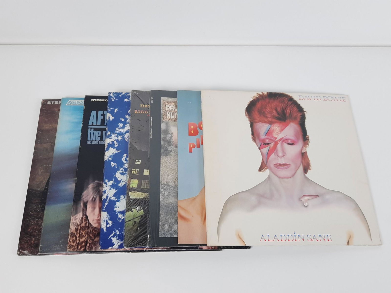 4 Rolling Stones and 4 David Bowie Records (1 of 4)