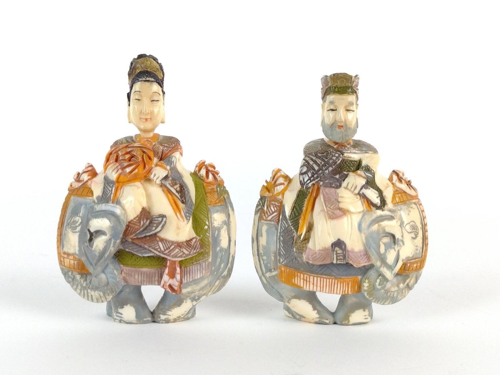 2 Bone Figural Snuff Bottles: 2" wide x 3" high. Spoon of male figure broken but present. DP. IMPORTANT: Before bidding, please read the terms and conditions. When you registered for the auction you agreed to these terms and will 