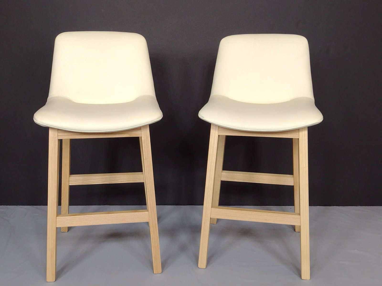 Pair Of Rove Concepts Aubrey Counter Stools: 18" wide X 18-1/2" deep X 36-1/2" high. MG. IMPORTANT: Before bidding, please read the terms and conditions. When you registered for the auction you agreed to these terms and will be required to compl