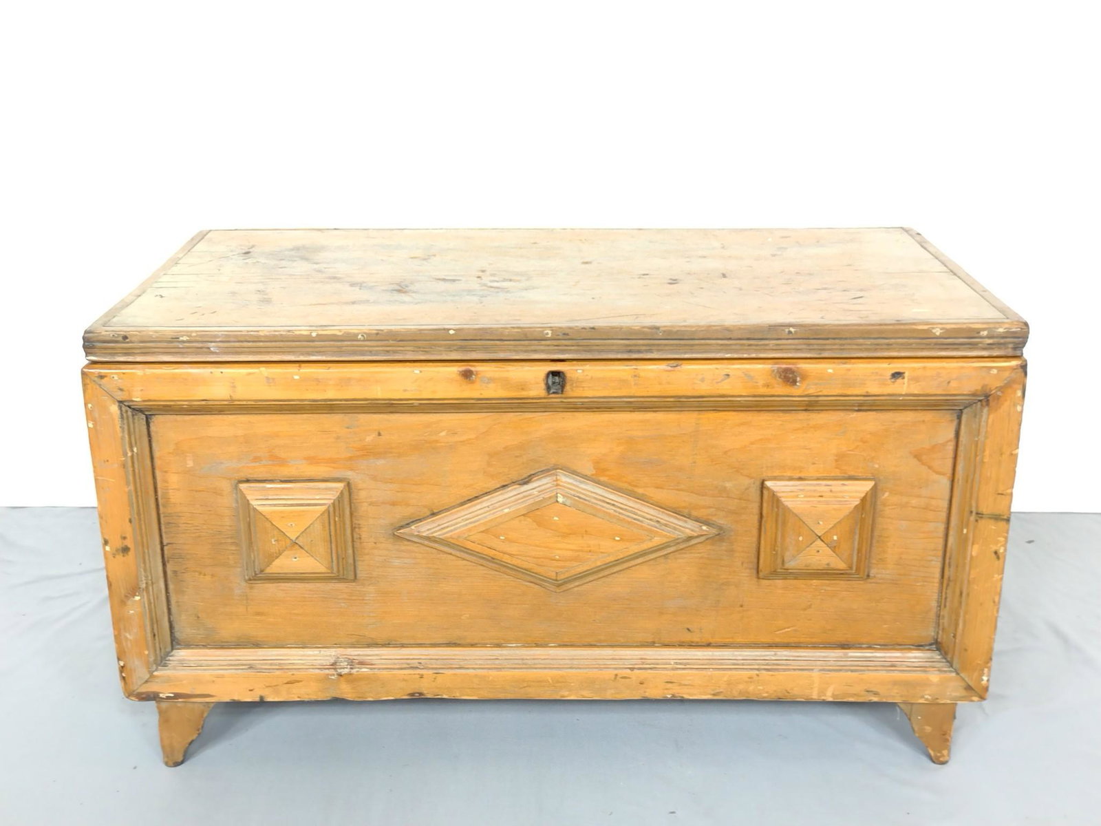 Blanket Chest: 32-1/2" wide X 16" deep X 18" high. Has some fading and scratches. MG. IMPORTANT: Before bidding, please read the terms and conditions. When you registered for the auction you agreed to these terms an