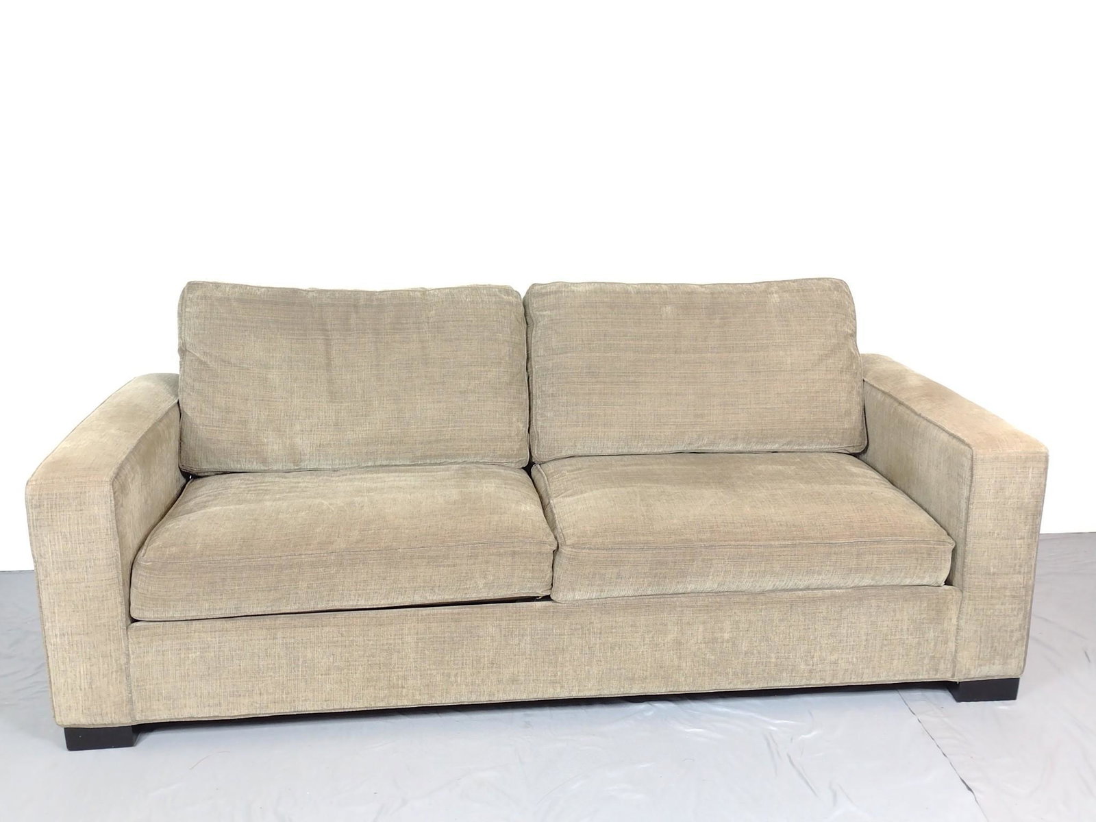 Younger Furniture Inc. Sofa: 86-1/2" wide X 39" deep X 32" high. Has some sun fading. MG. IMPORTANT: Before bidding, please read the terms and conditions. When you registered for the auction you agreed to these terms and will be 