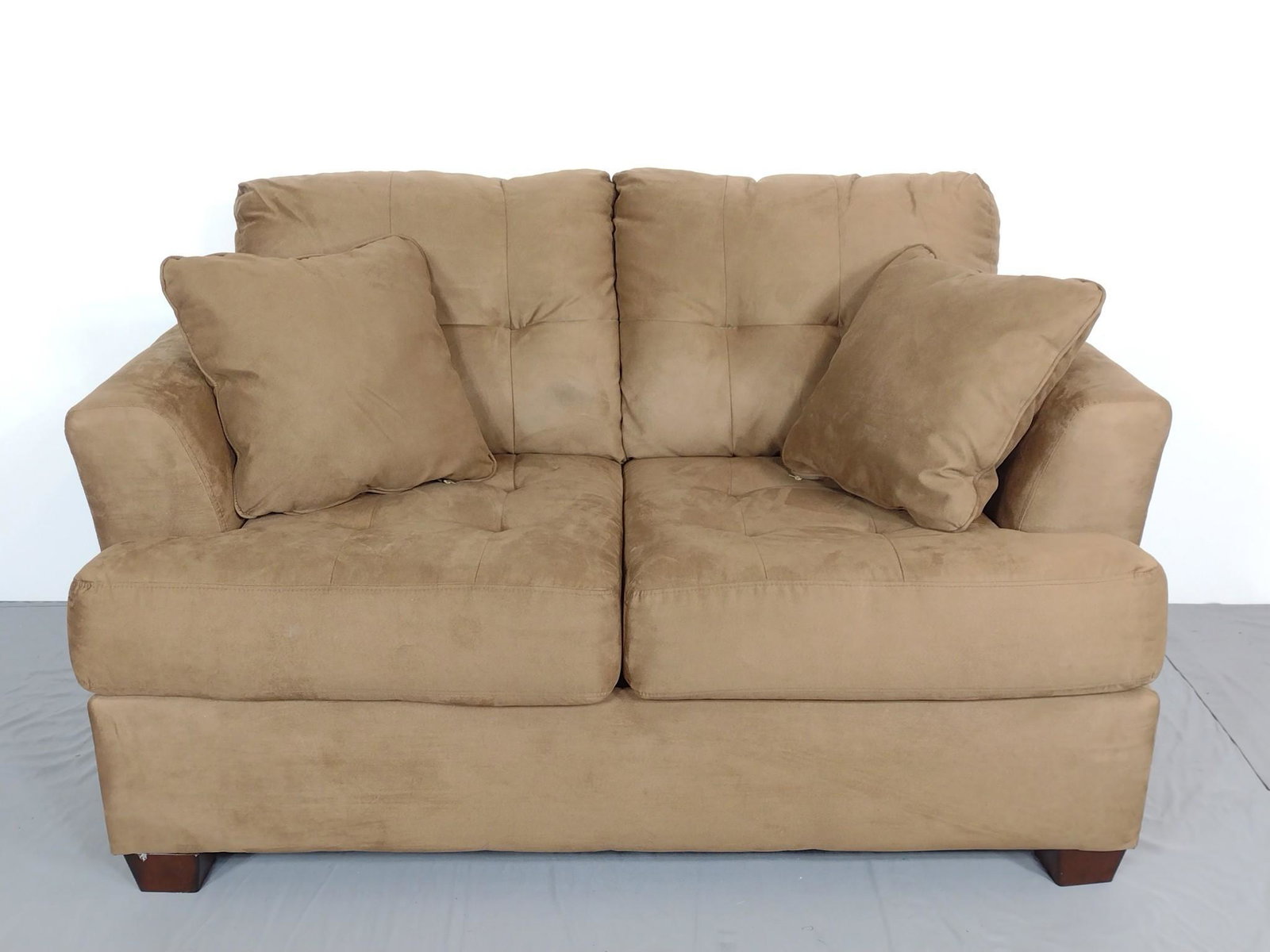 Ashley Furniture Love Seat: 57" wide X 34" deep X 36" high. MG. IMPORTANT: Before bidding, please read the terms and conditions. When you registered for the auction you agreed to these terms and will be required to comply with t