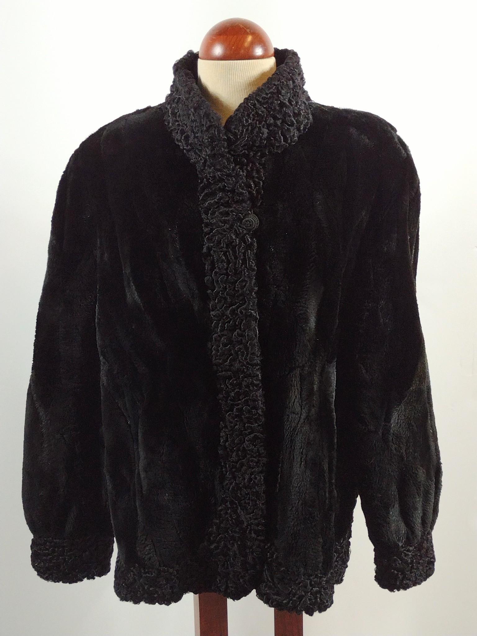 Ferrara Collection Fur Jacket: Made in Canada. 19-1/2" shoulder width x 30" total length. Monogrammed to interior lining. DP. IMPORTANT: Before bidding, please read the terms and conditions. When you registered for the auction you 