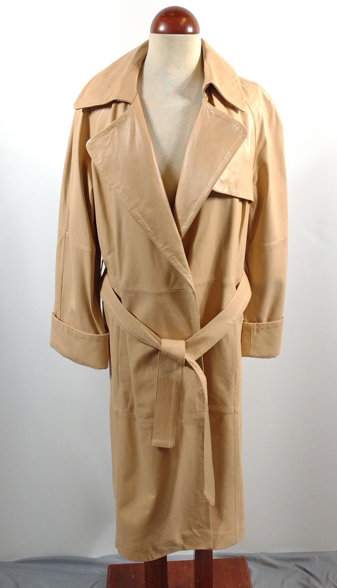 Spiegel Leather Trench Coat: Made in China. 19" shoulder width x 45" total length. Size 12. DP. IMPORTANT: Before bidding, please read the terms and conditions. When you registered for the auction you agreed to these terms and wi