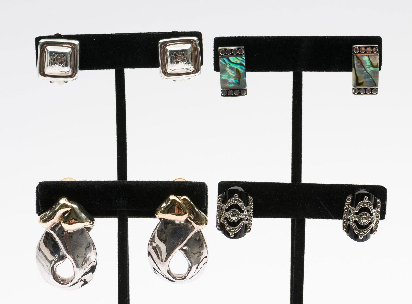 4 Pairs Sterling Clip On Earrings: Includes monogrammed and abalone. 3/4" to 1-1/2" long. DP. IMPORTANT: Before bidding, please read the terms and conditions. When you registered for the auction you agreed to these terms and will be re