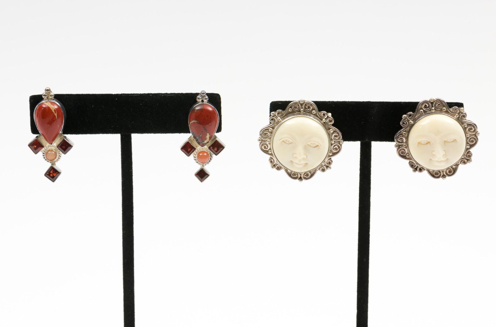 2 Pairs Sajen Sterling Clip On Earrings Incl Marianna Richard: Includes sterling and bone face earrings on original Marianna Richard card and red stone earrings. Both marked Sajen .925. 1-1/8" to 1-1/4" long. DP. IMPORTANT: Before bidding, please read the terms a