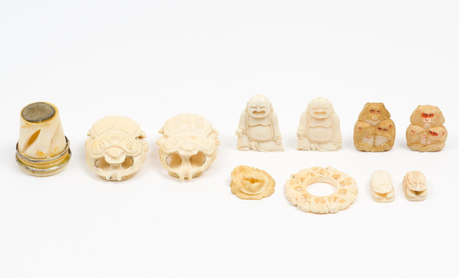 11 Carved bone Articles incl Scarabs & Thimble: 1/2" to 1-1/2". MH. IMPORTANT: Before bidding, please read the terms and conditions. When you registered for the auction you agreed to these terms and will be required to comply with them.