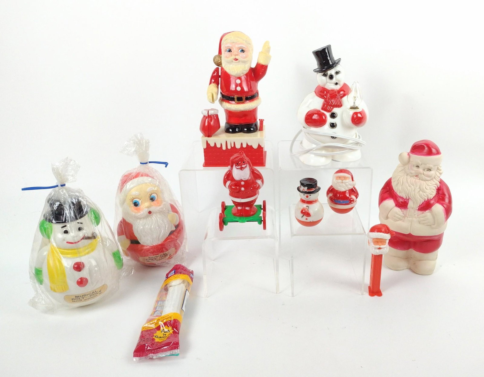 10 Vintage Novelty Christmas Toys & Lights: 2-3/4" to 8" high. RM IMPORTANT: Before bidding, please read the terms and conditions. When you registered for the auction you agreed to these terms and will be required to comply with them.