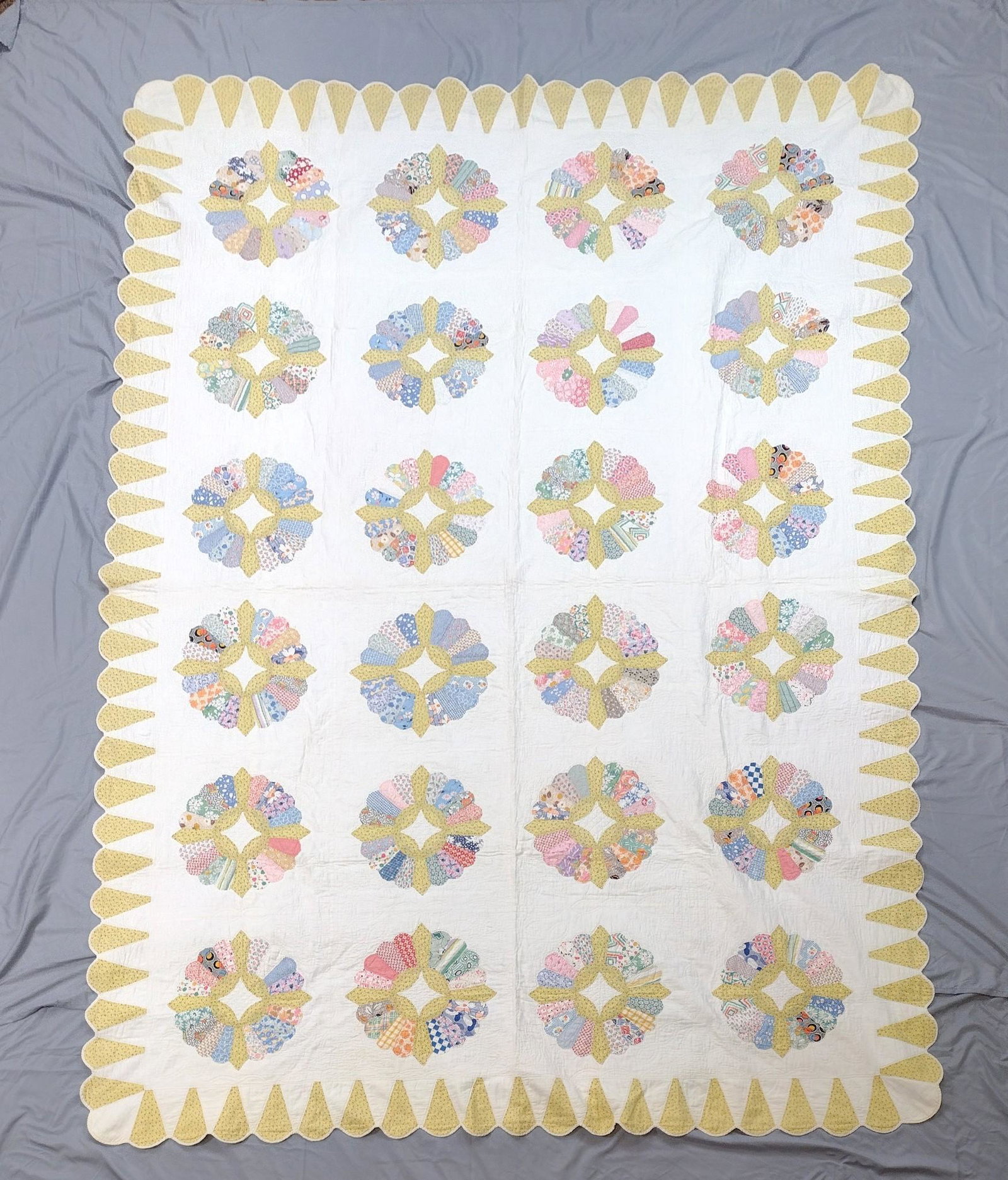 Patchwork Quilt: 8'8'' wide x 5'6" long. MEG IMPORTANT: Before bidding, please read the terms and conditions. When you registered for the auction you agreed to these terms and will be required to comply with them.