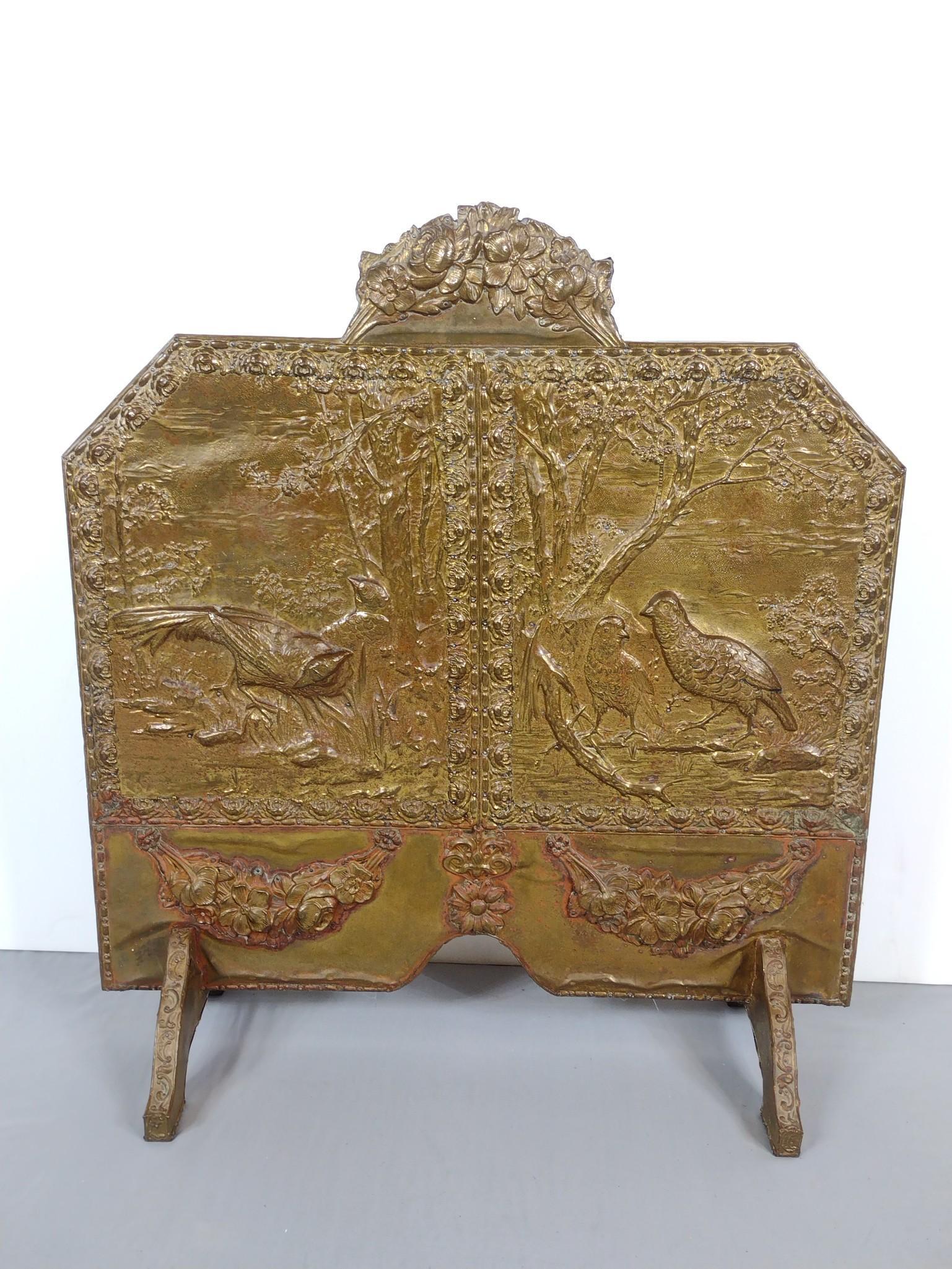 Brass Fire Screen: 29-1/2" wide X 12" deep X 32" high. Has dents at feet. MG. IMPORTANT: Before bidding, please read the terms and conditions. When you registered for the auction you agreed to these terms and will be re
