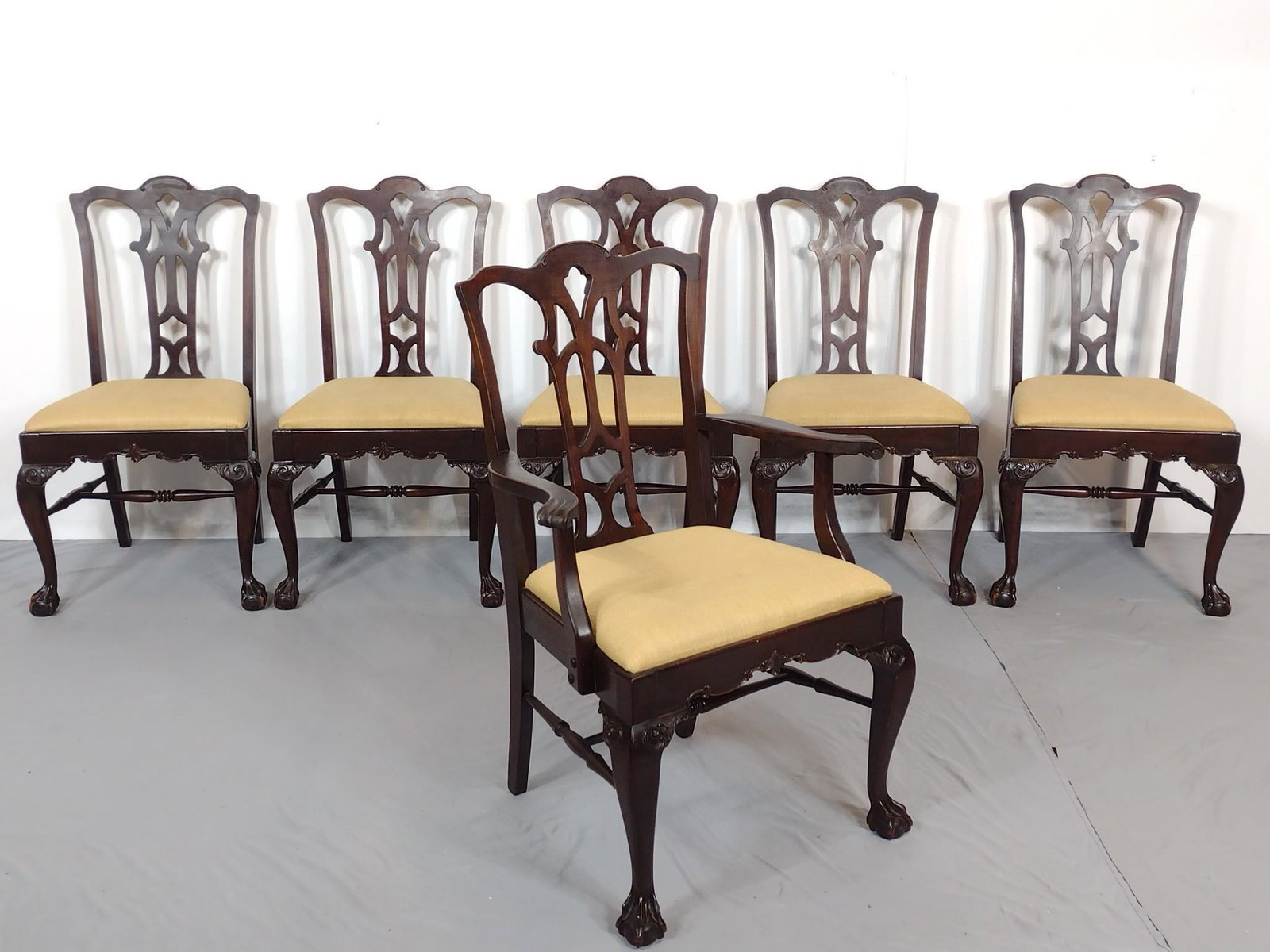 6 Ball & Claw Foot Chairs: Arm Chair 27" wide X 23" deep X 39-1/2" high. Side chairs 21-1/2" wide X 23" deep X 38-1/2" high. One chair has broken cross bar. MG. IMPORTANT: Before bidding, please read the terms and conditions. W