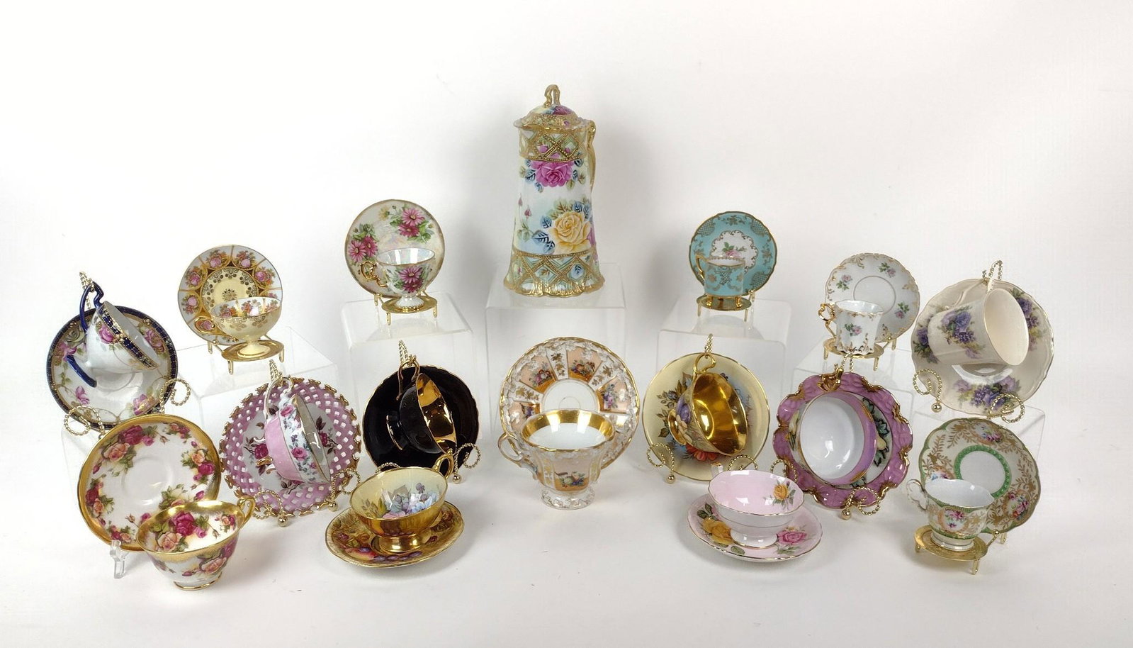 15 Hand Painted Teacups and Chocolate Pot incl Paragon: Makers Napco China, TPM, Paragon, Sterling China, Slovakia Dekor, Aynsley, Mitterneich, Aster, and Royal Chelsea. With 12 displays. 2-3/4" to 5" wide X 2" to 3-1/4" high. MEG IMPORTANT: Before bidding