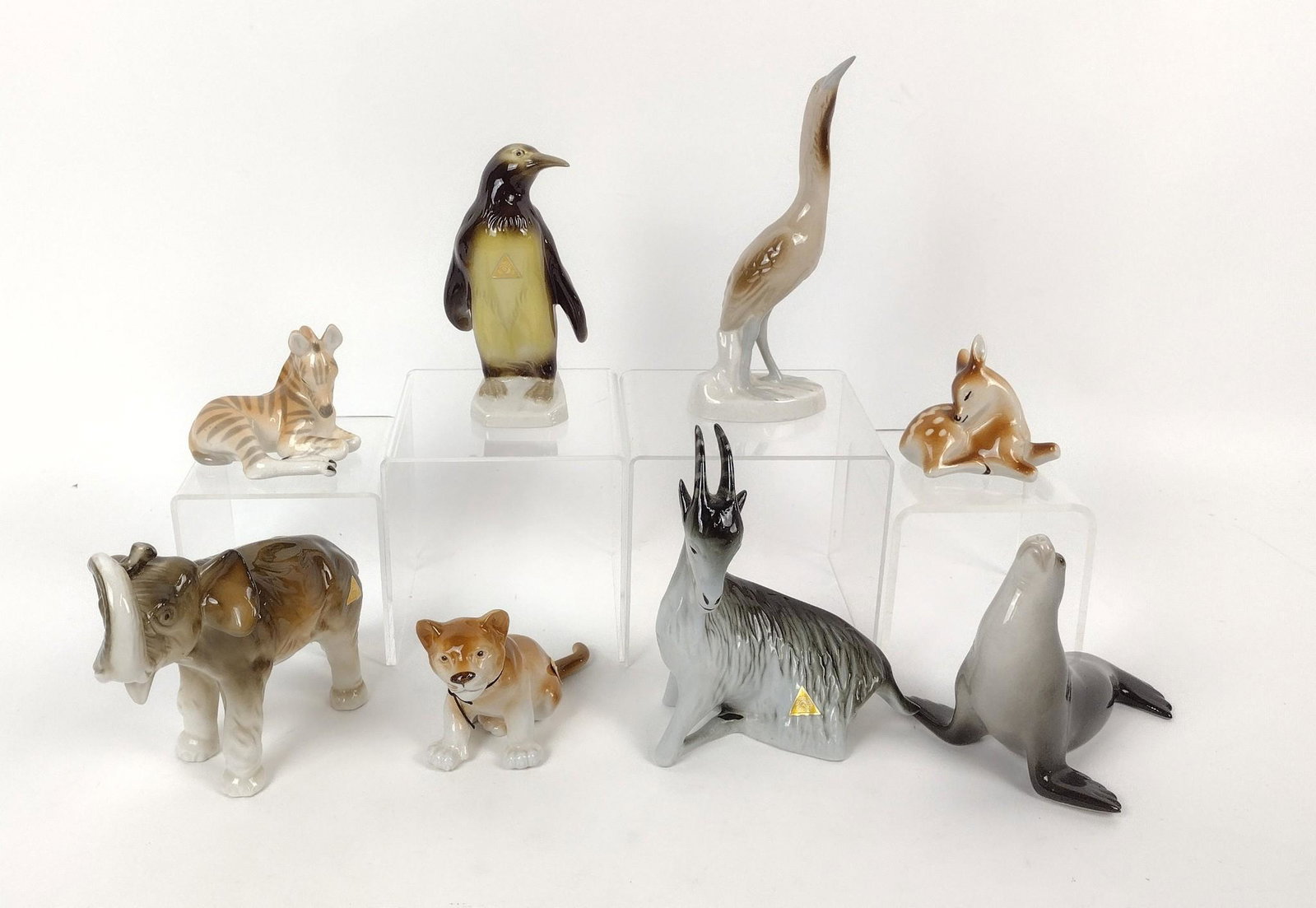 8 Royal Dux & Lomonosov Animal Figurines: 2-1/4" to 7-1/4" high. MEG IMPORTANT: Before bidding, please read the terms and conditions. When you registered for the auction you agreed to these terms and will be required to comply with them.
