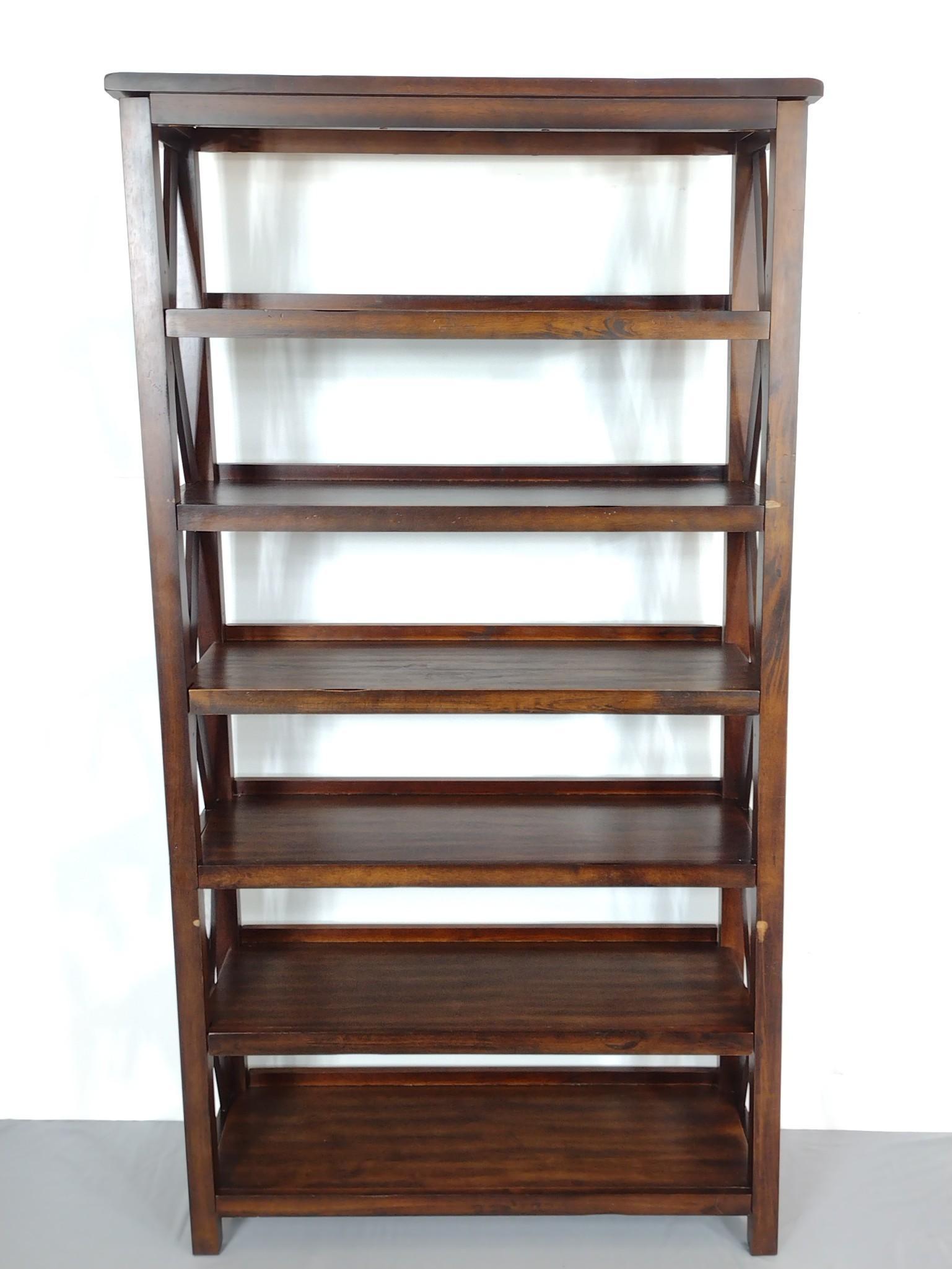 Crisscross Etagere Bookcase: 38" wide X 15" deep X 72" high. Has some light scratches. MG. IMPORTANT: Before bidding, please read the terms and conditions. When you registered for the auction you agreed to these terms and will be