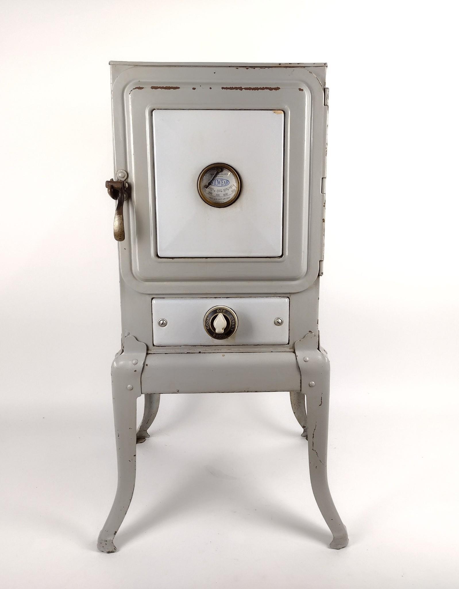 1922 Wilwear Portable Electric Oven: Working. Some rusting consistent with age and use. 14-1/4" wide X 31-3/4" high. MEG IMPORTANT: Before bidding, please read the terms and conditions. When you registered for the auction you agreed to t