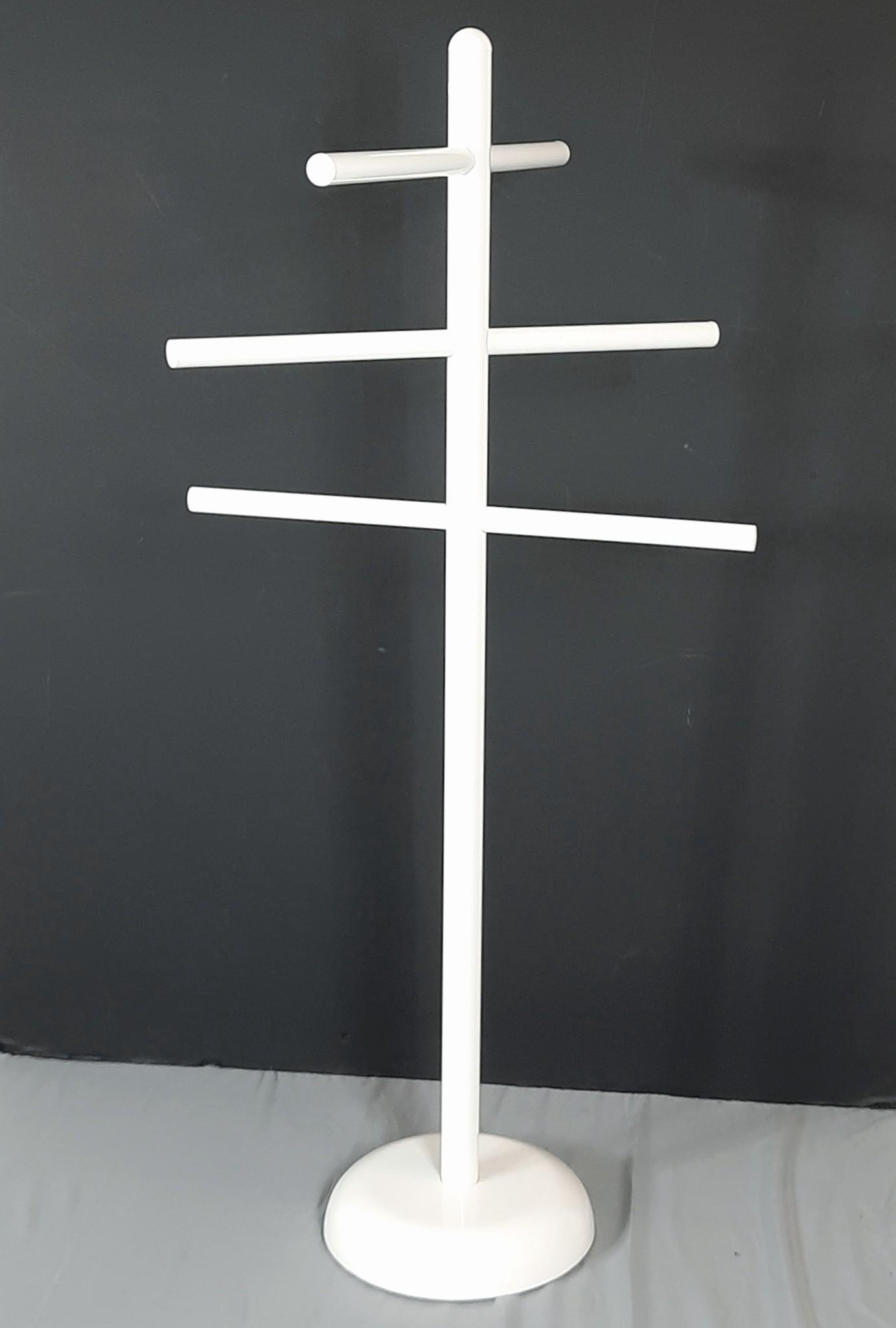 Towel Rack: No manufacturers markings. 24" diameter x 52" high. Plaster weighted base. LR IMPORTANT: Before bidding, please read the terms and conditions. When you registered for the auction you agreed to these t