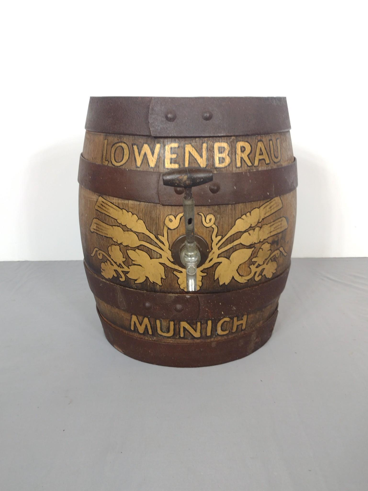 Lowenbrau Munich Beer Tap: Top rim marked "Drexler". 19" diameter X 19" high. Has some discoloring. MG. IMPORTANT: Before bidding, please read the terms and conditions. When you registered for the auction you agreed to these te