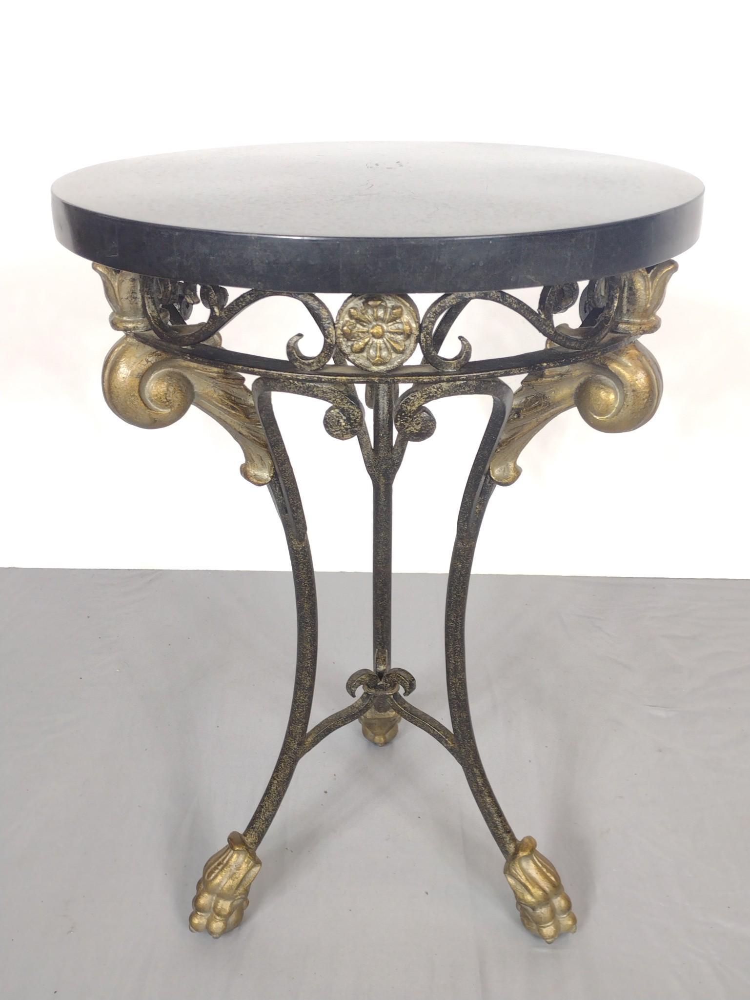 Emerson and Cie Metal and Stone Table: Stone top with brass accents. 18" diameter X 26" high. MG. IMPORTANT: Before bidding, please read the terms and conditions. When you registered for the auction you agreed to these terms and will be re