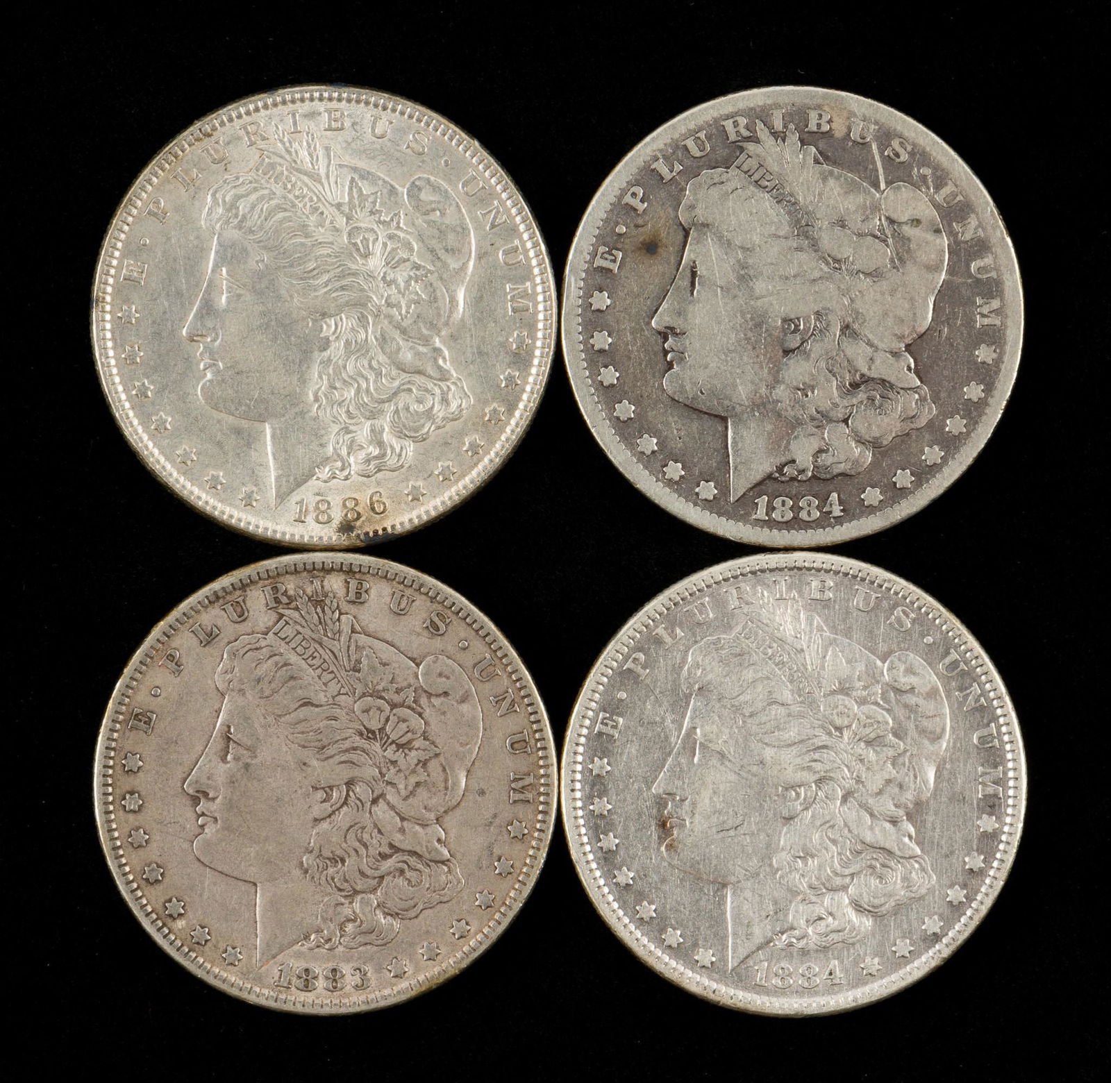 4 Morgan Silver Dollars Incl 1883 (1 of 2)