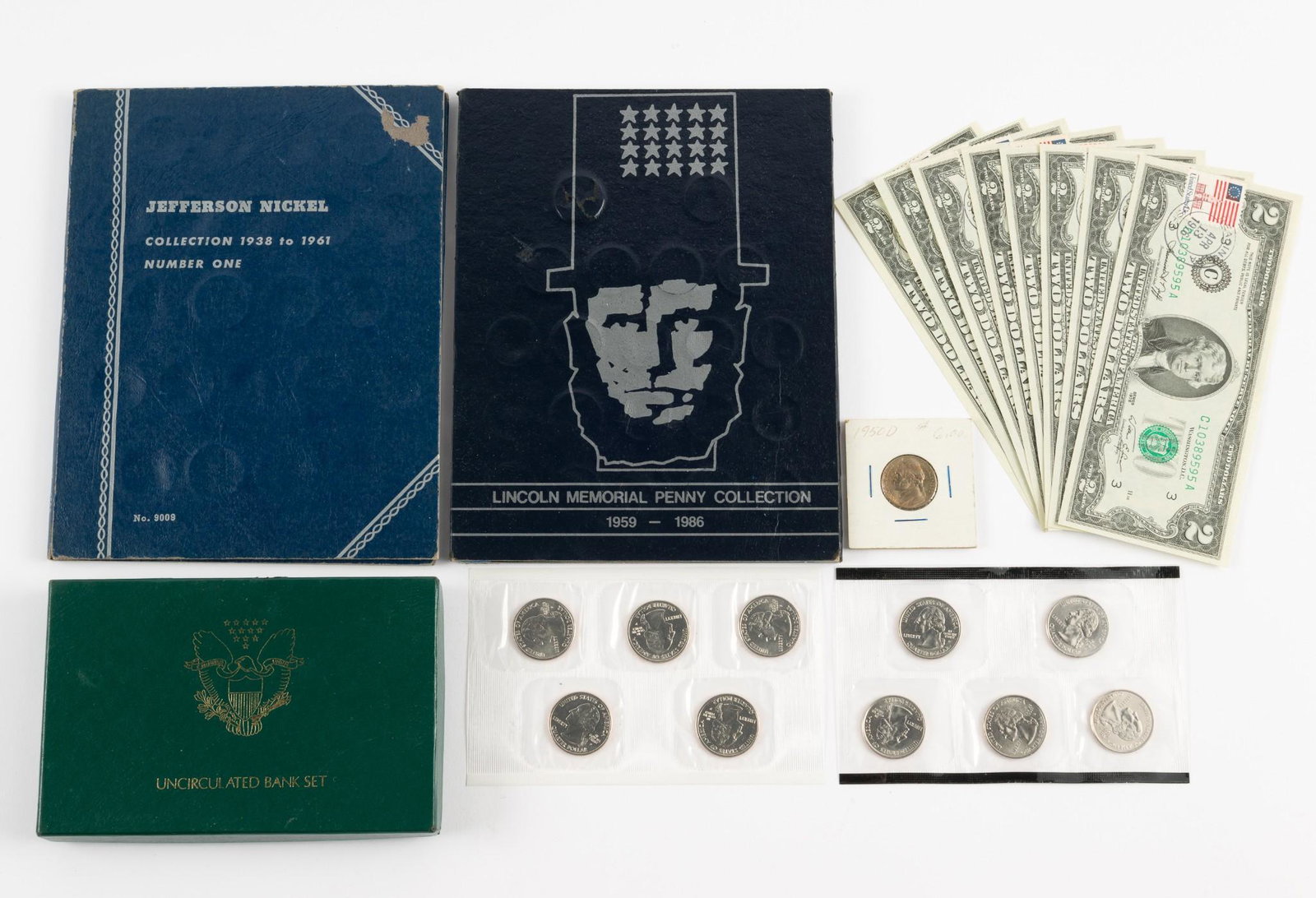 U.S Coins and Currency Incl 1st Day Issue: Includes 1950-D 5 cent, 60 Lincoln cents, 31 Jefferson nickels, 1991-D UNC. set, 2001 25 cent set, and eight 1976 1st Day Issue $2 bills, UNC. DP. IMPORTANT: Before bidding, please read the terms and 