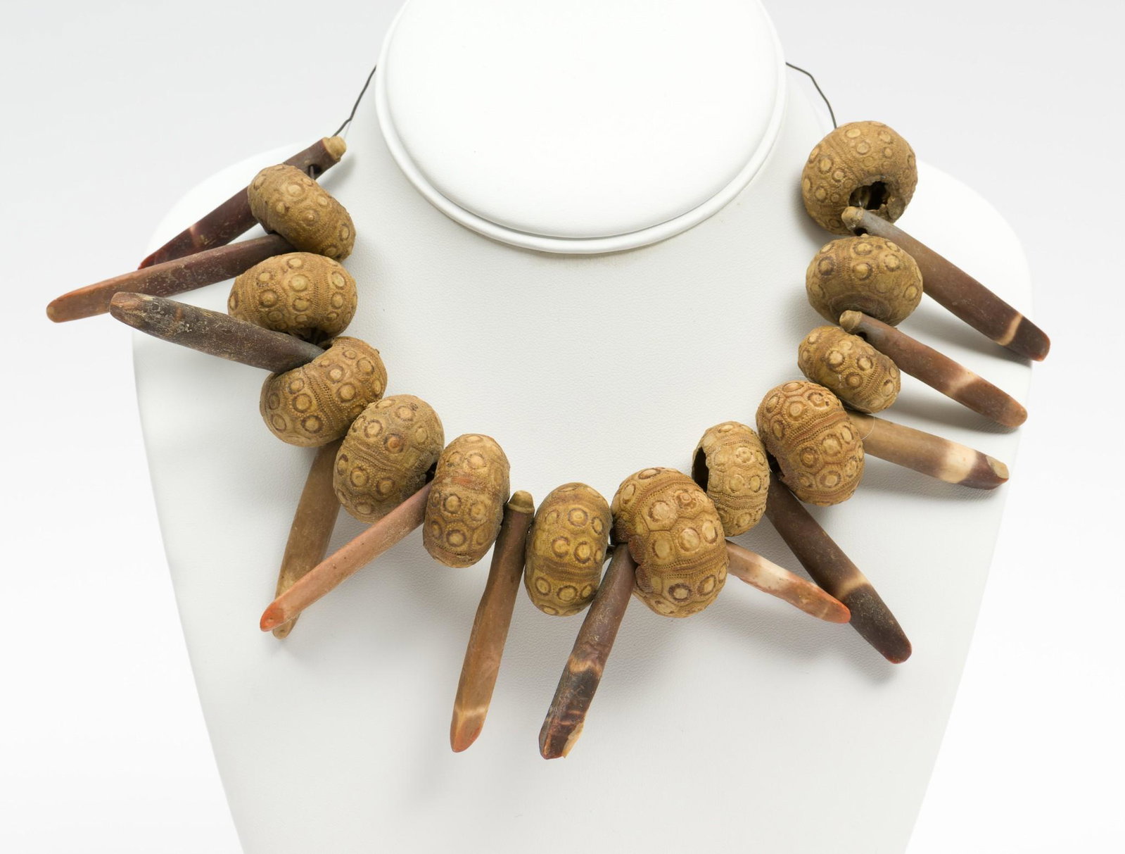 Necklaces, Earrings, & Pendant Incl Hand Made: Includes hand made sea urchin necklace 18" long, hand made clay bead and silver link necklace 32" long, and quartz earrings 3-1/2" long with pendant. Also includes smoky quartz money clip marked sterl