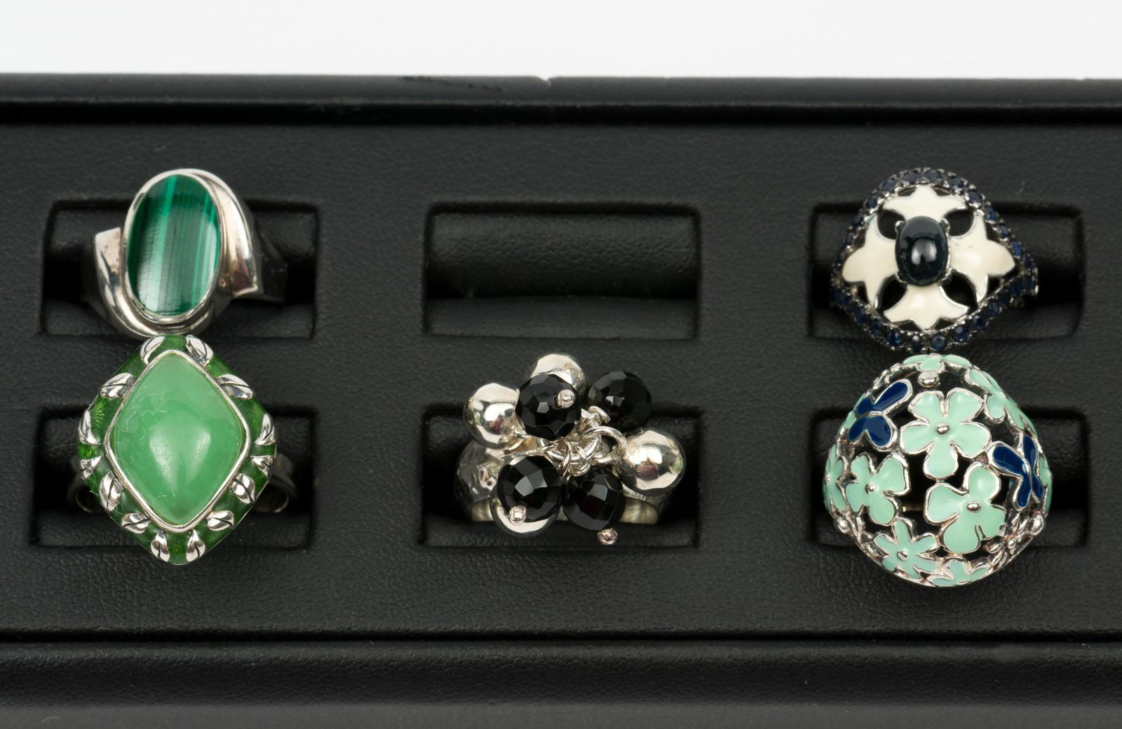 5 Sterling Fashion Rings Incl Malachite, Onyx, and Jade: Sizes 7 and 10. 2/3" to 3/4" wide. MH. IMPORTANT: Before bidding, please read the terms and conditions. When you registered for the auction you agreed to these terms and will be required to comply wit