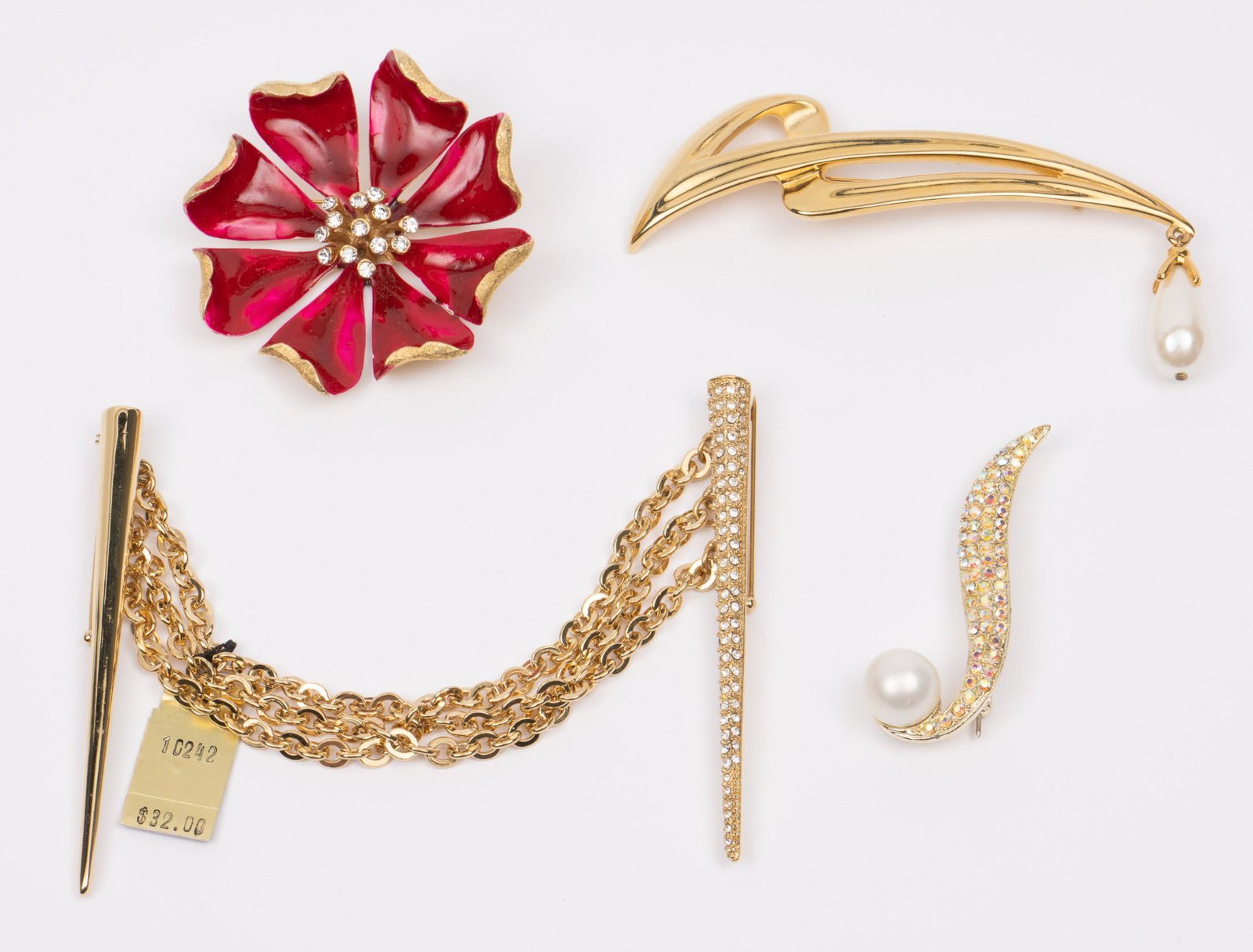 4 Costume Brooches incl Monet, Marvella, Celebrity: 2-1/4" wide to 4" wide. MH. IMPORTANT: Before bidding, please read the terms and conditions. When you registered for the auction you agreed to these terms and will be required to comply with them.