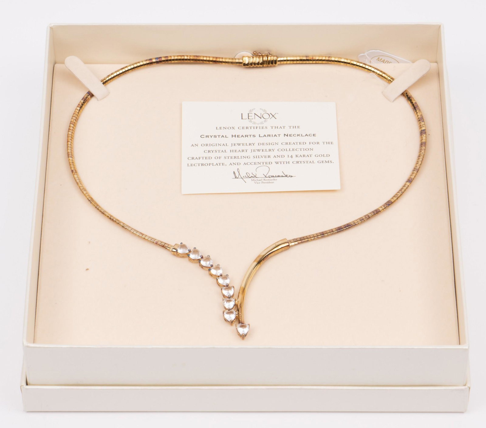 Lenox Crystal Hearts Lariat Necklace: Vermeil (marked 925) and crystals. In original box. 16" long. MH. IMPORTANT: Before bidding, please read the terms and conditions. When you registered for the auction you agreed to these terms and wil