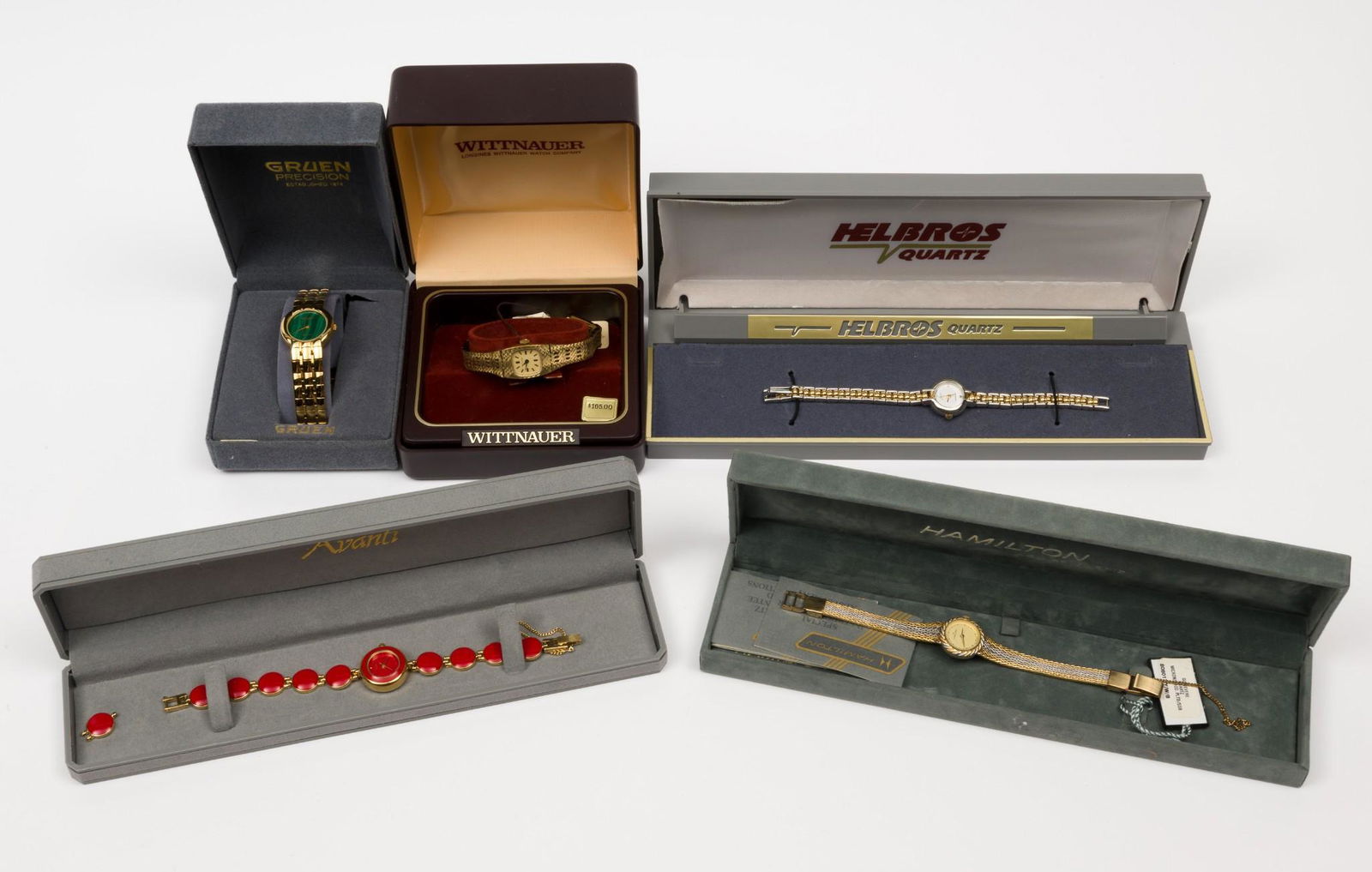 4 Ladies Fashion Wristwatches incl Gruen: Also includes Wittenauer, Avanti, Helbros, and Hamilton. Each appears unworn in original box. Each with quartz movement. 2/3" to 1" lug to lug. MH. IMPORTANT: Before bidding, please read the terms and