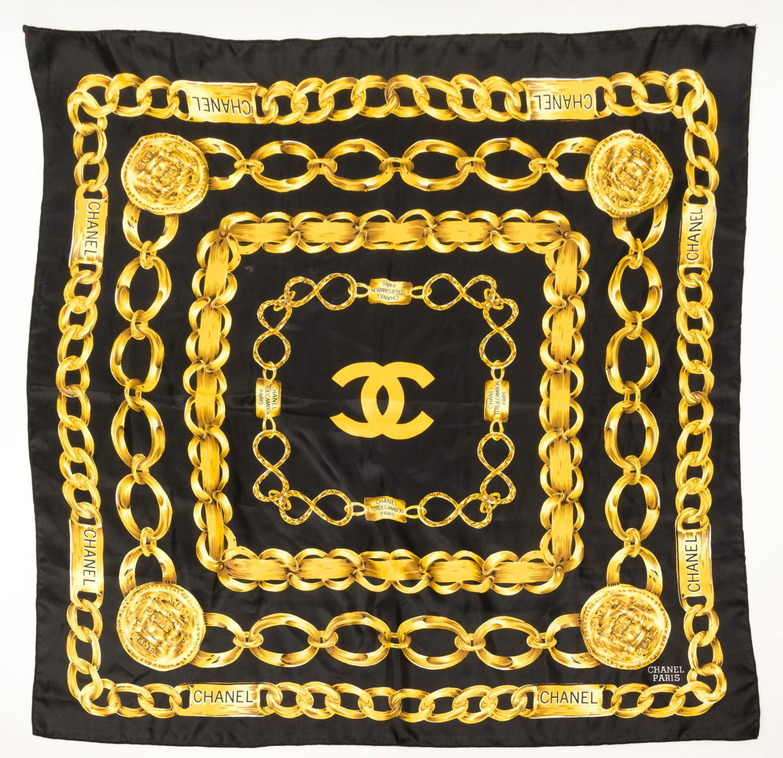 Chanel Silk Scarf: 34" square. One area of fraying to edge; see image. MH. IMPORTANT: Before bidding, please read the terms and conditions. When you registered for the auction you agreed to these terms and will be requi