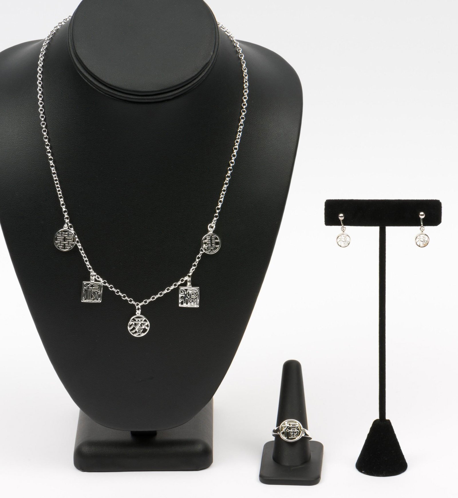 Lenox Sterling Necklace, Earrings, and Ring: Necklace 18" long, earrings 3/4" long, ring size 10, 1/2" wide. Each with original bag and box. MH. IMPORTANT: Before bidding, please read the terms and conditions. When you registered for the auction
