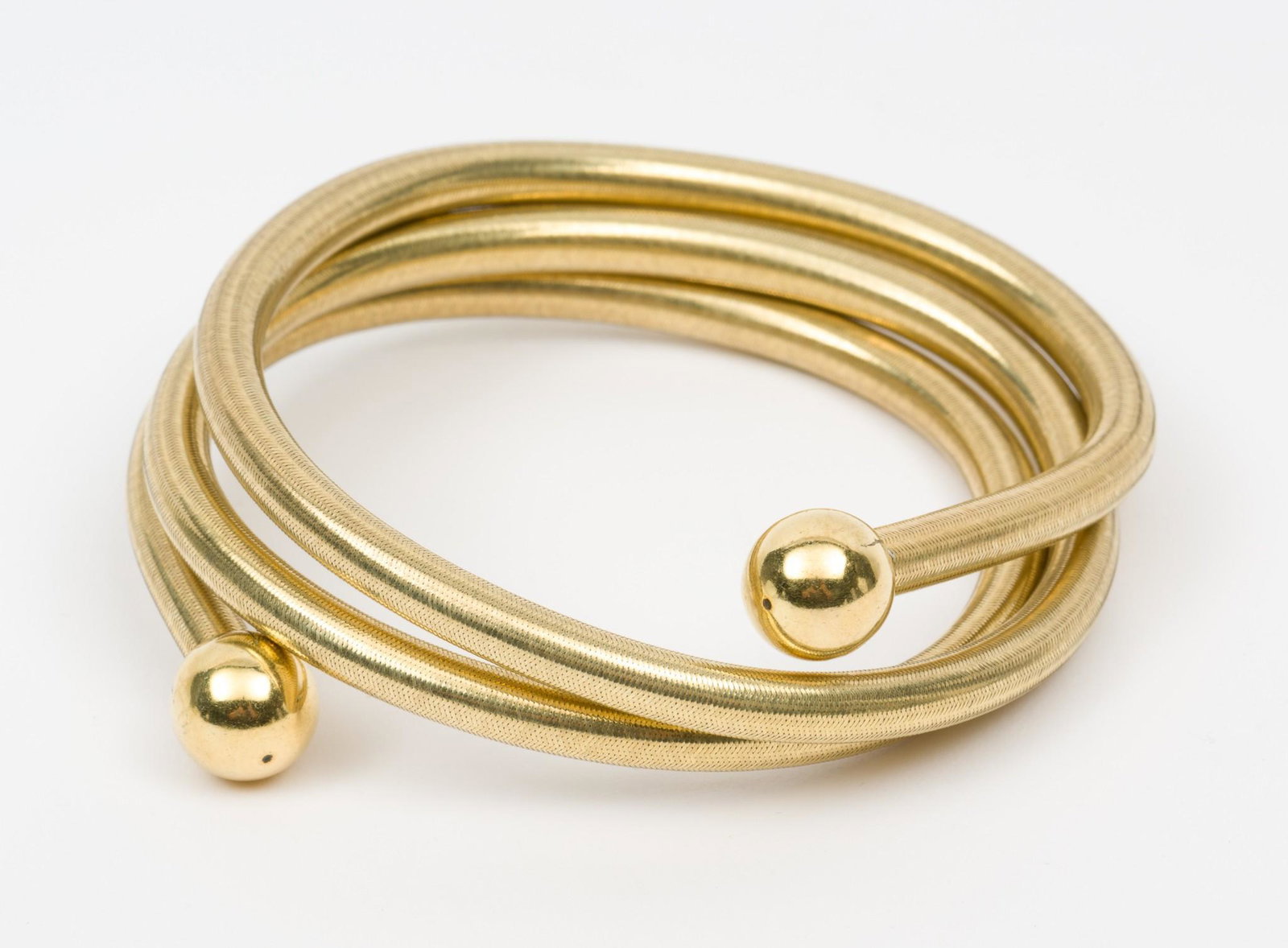 Ross Simons Adjustable Wrap Bracelet: 18K Gold plated. 13mm bead details. In original box. MH. IMPORTANT: Before bidding, please read the terms and conditions. When you registered for the auction you agreed to these terms and will be requ