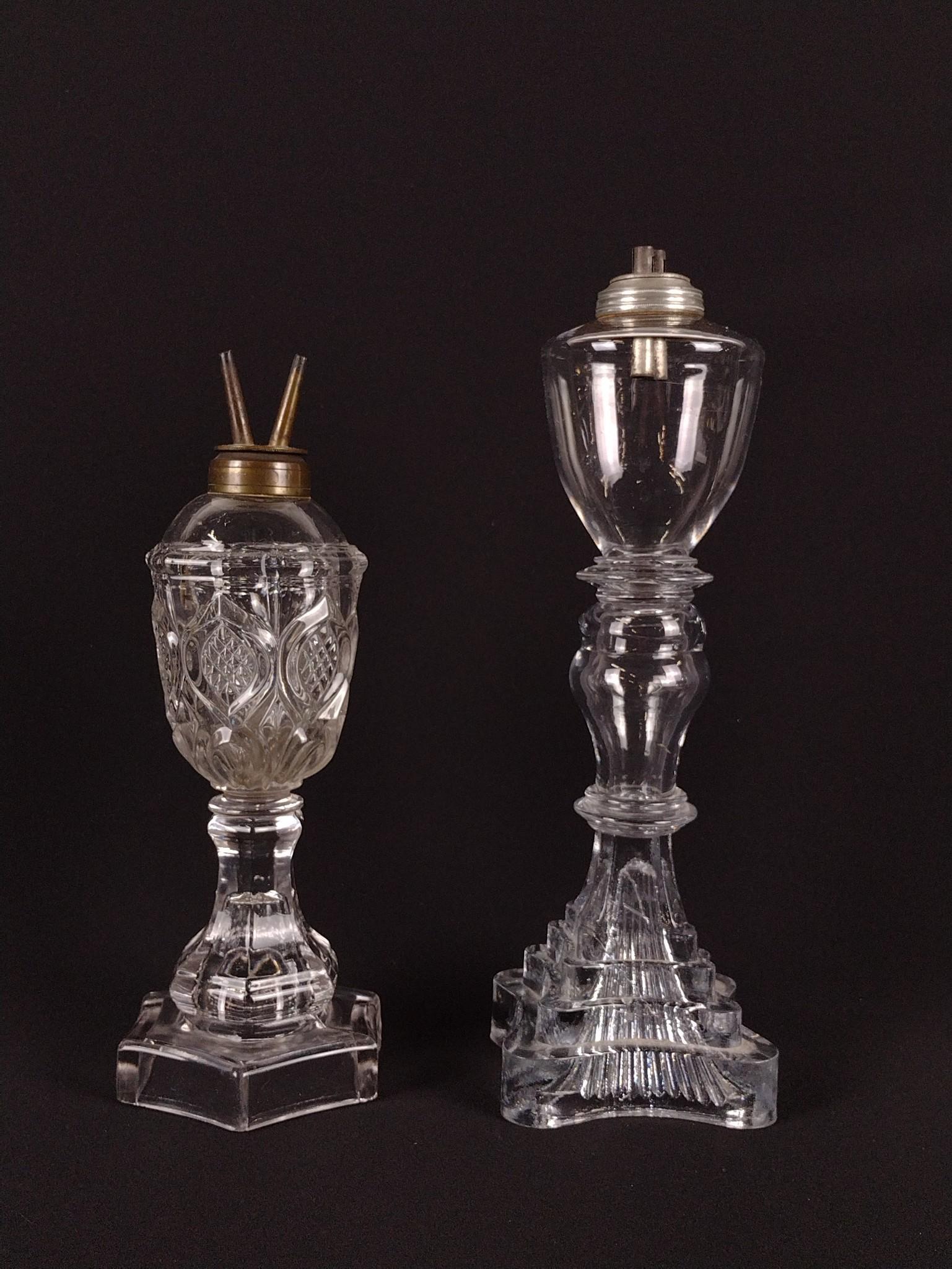 2 Antique Whale Oil Lamps: 10-1/4" to 11-3/4" high. DP. IMPORTANT: Before bidding, please read the terms and conditions. When you registered for the auction you agreed to these terms and will be required to comply with them.