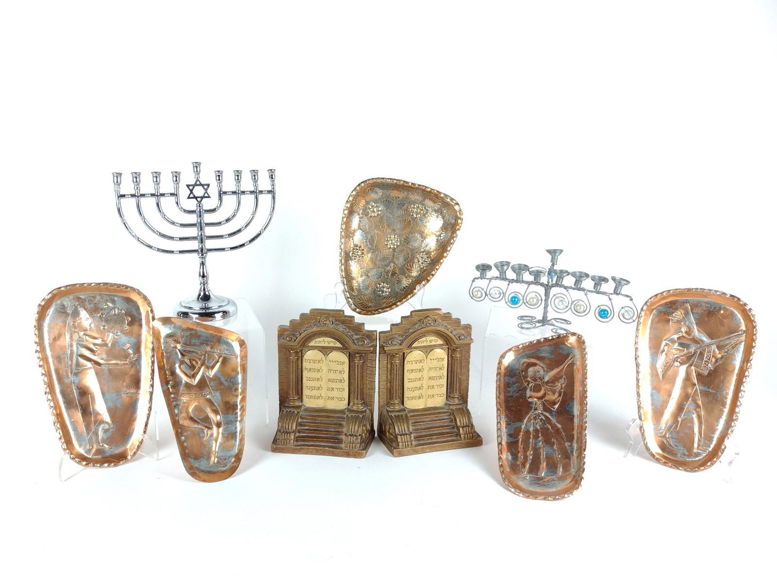 8 Pcs Judaica Incl Bookends: 4-1/4" to 8-3/4" high. DP. IMPORTANT: Before bidding, please read the terms and conditions. When you registered for the auction you agreed to these terms and will be required to comply with them.