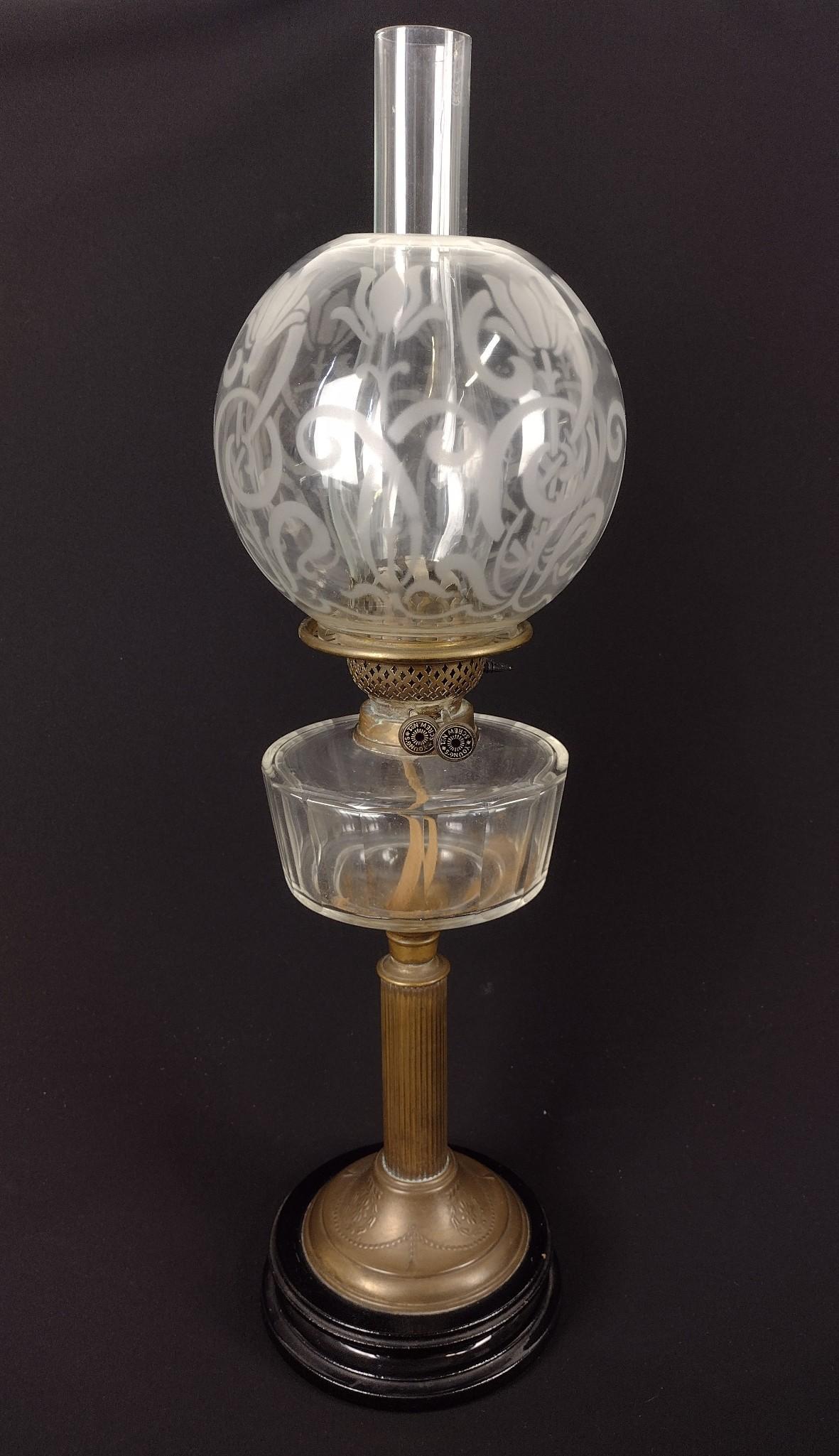 Double Wicked Etched Glass Banquet Lamp: Burner knobs marked "Young's Screw No.1". 6-1/2" wide X 26" high. MEG IMPORTANT: Before bidding, please read the terms and conditions. When you registered for the auction you agreed to these terms and