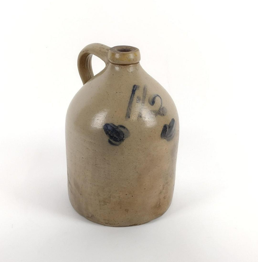 1-1/2 Gallon Cobalt Decorated Stoneware Jug: 1" diameter X 11" high. Some cracks. MEG IMPORTANT: Before bidding, please read the terms and conditions. When you registered for the auction you agreed to these terms and will be required to comply w