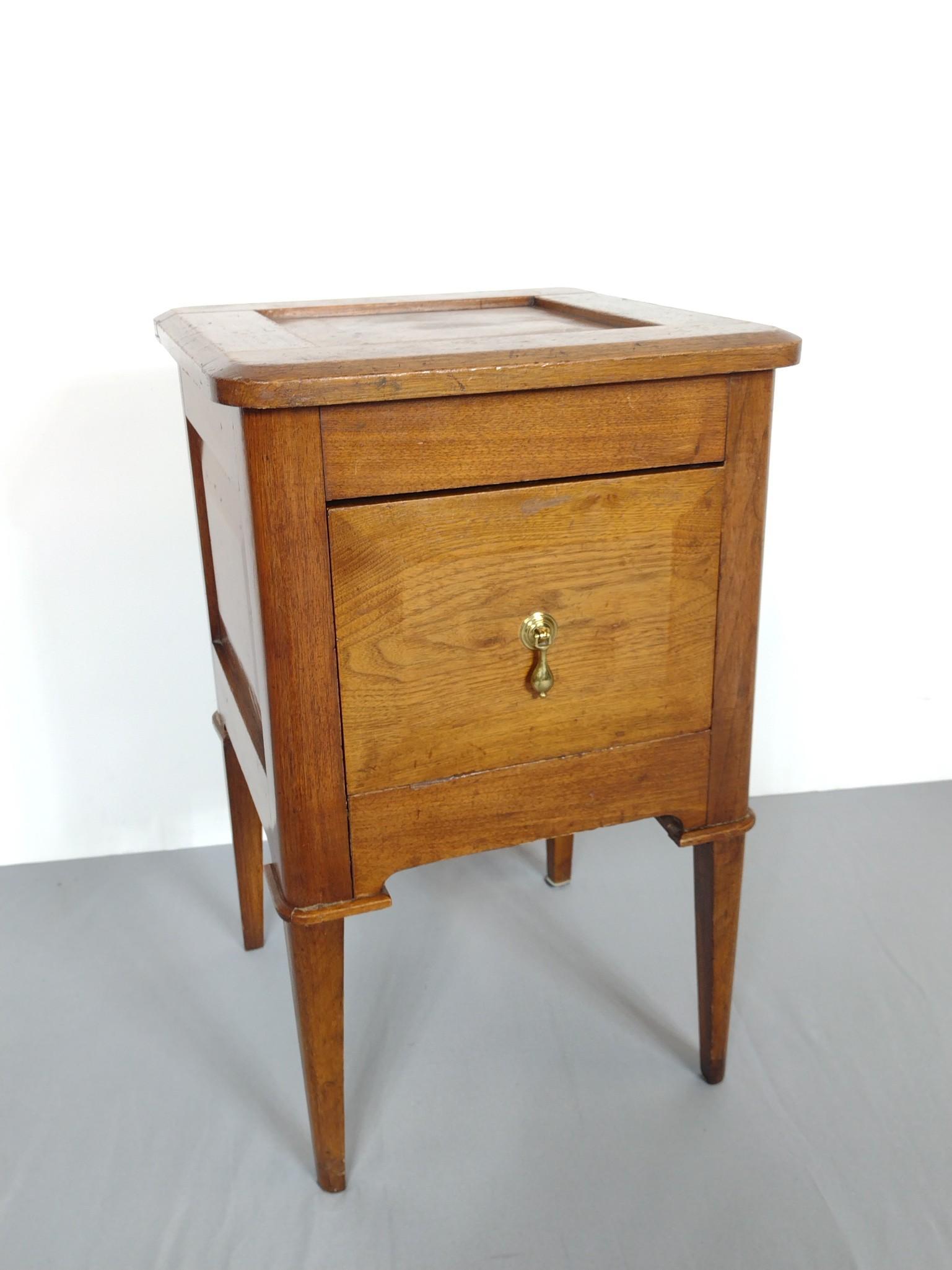 Antique Side Table: Commode converted to side table. 15-1/4" wide X 15-1/4" deep X 24-1/4" high. Has repair to back leg. Has some scratches. MG. IMPORTANT: Before bidding, please read the terms and conditions. When you r