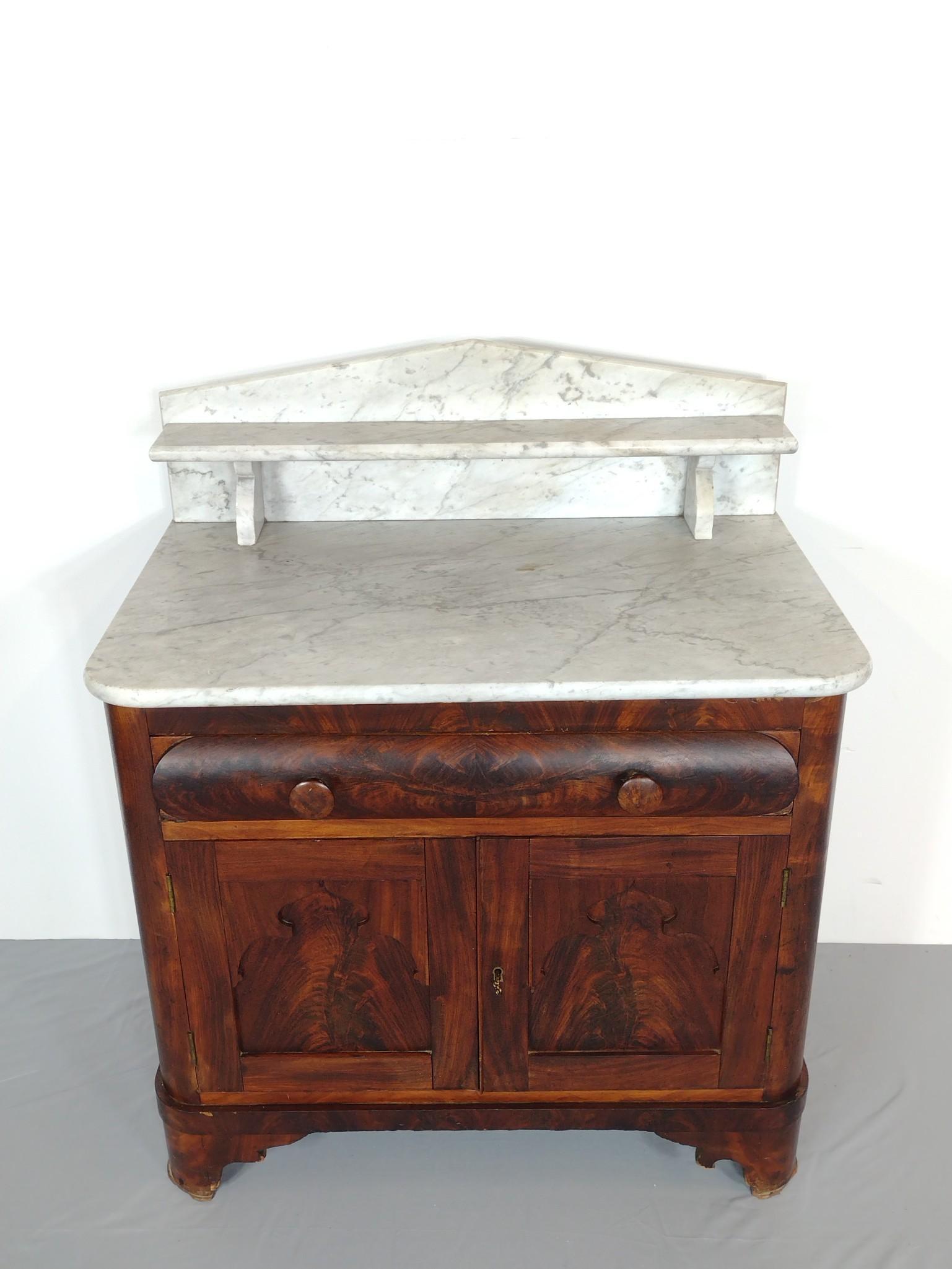 Marble Top Wash Stand: 33" wide X 20" deep X 39" high. Has a few light scratches. MG. IMPORTANT: Before bidding, please read the terms and conditions. When you registered for the auction you agreed to these terms and will b