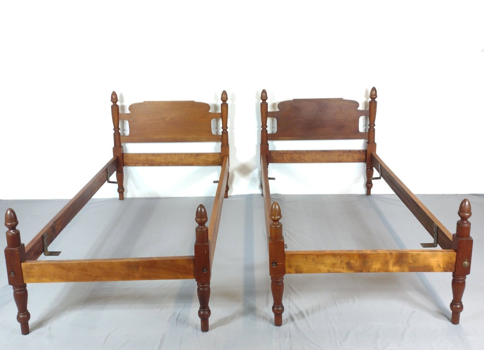 Pair Of Acorn Beds: Each 40" wide X 82" deep X 39" high. All but one bolt cover are missing from head and foot boards. MG. IMPORTANT: Before bidding, please read the terms and conditions. When you registered for the auct